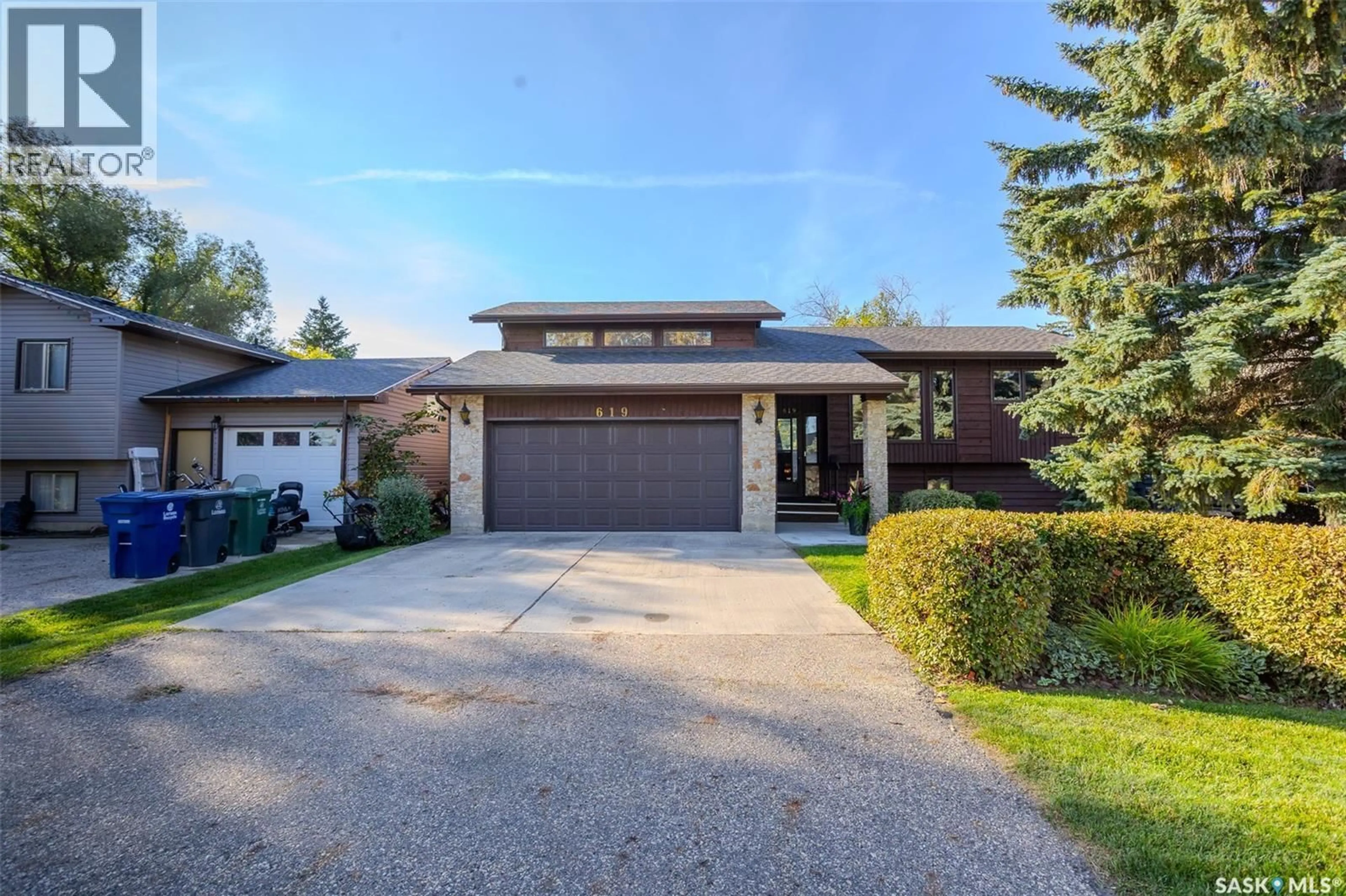 Home with brick exterior material, street for 619 CLOVER AVENUE, Dalmeny Saskatchewan S0K1E0