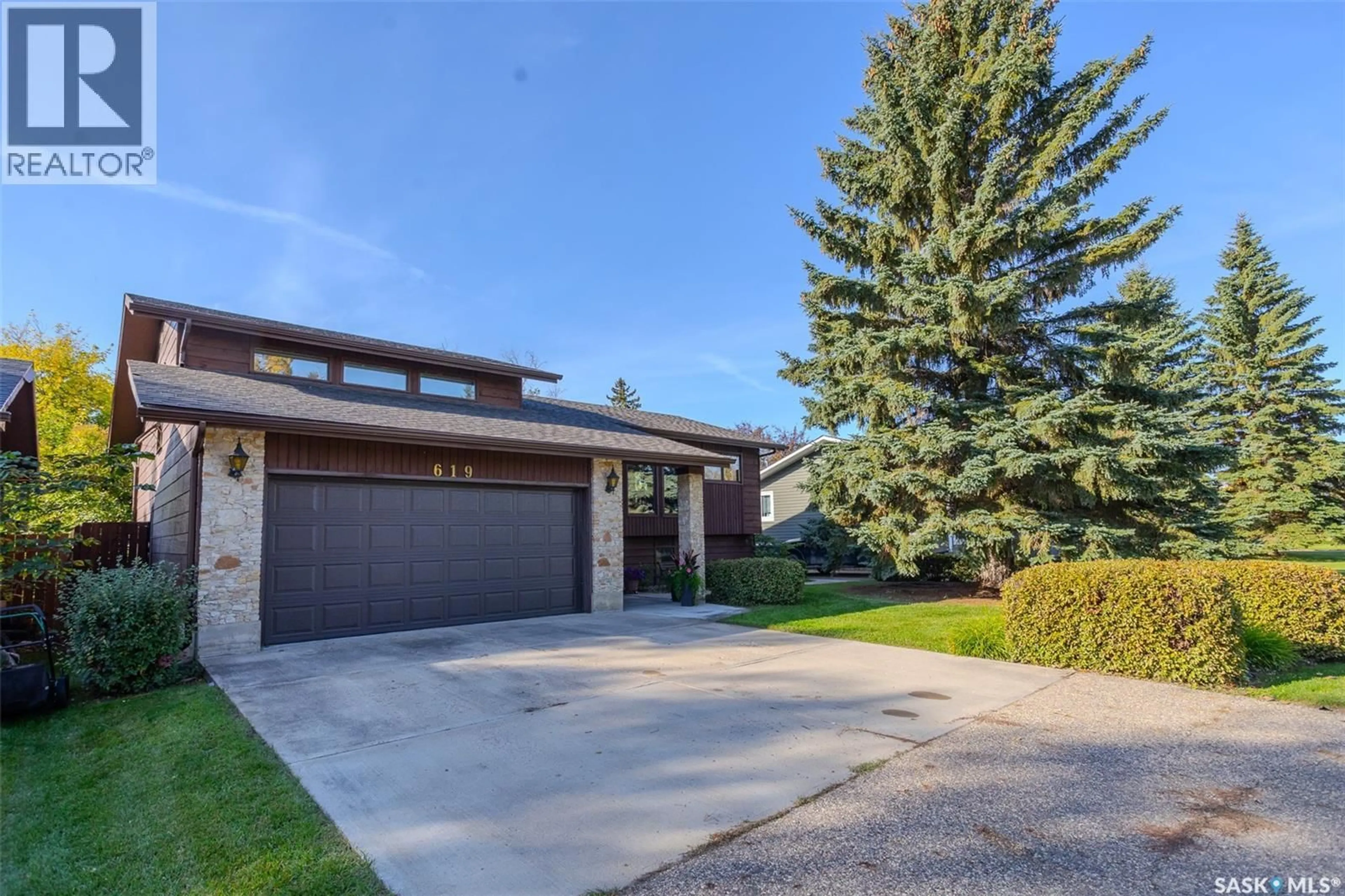 Home with brick exterior material, street for 619 CLOVER AVENUE, Dalmeny Saskatchewan S0K1E0