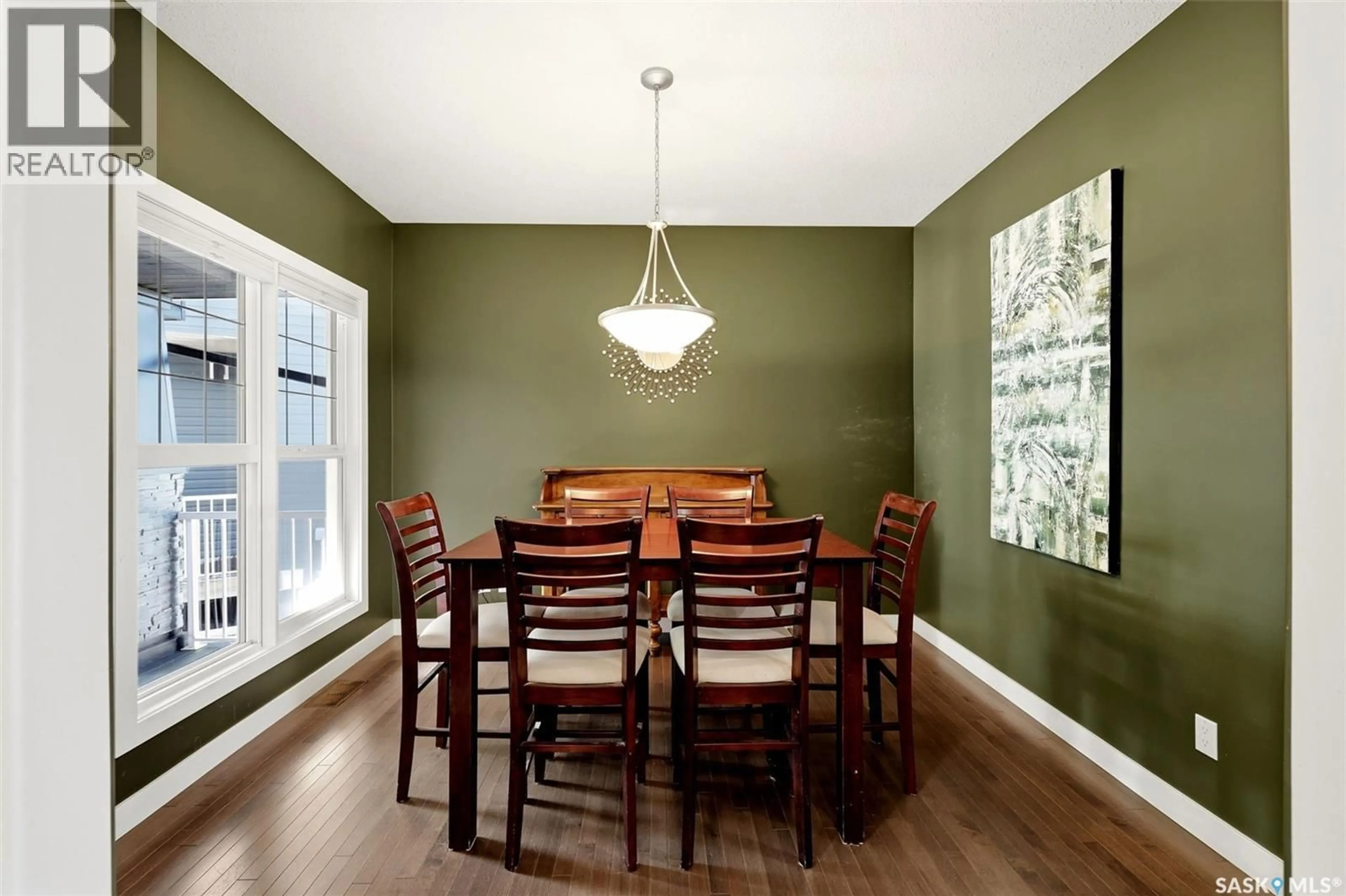 Dining room, wood/laminate floor for 113 POPLAR BLUFF CRESCENT, Regina Saskatchewan S4Y0B5
