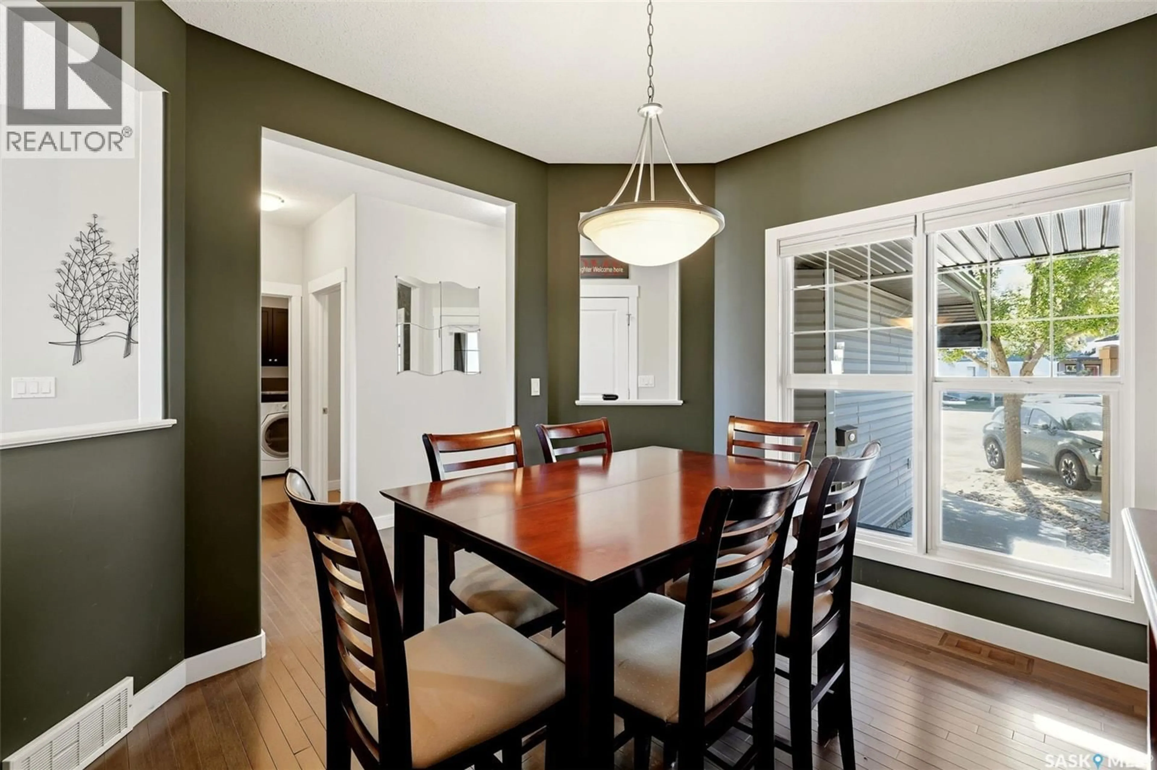 Dining room, wood/laminate floor for 113 POPLAR BLUFF CRESCENT, Regina Saskatchewan S4Y0B5