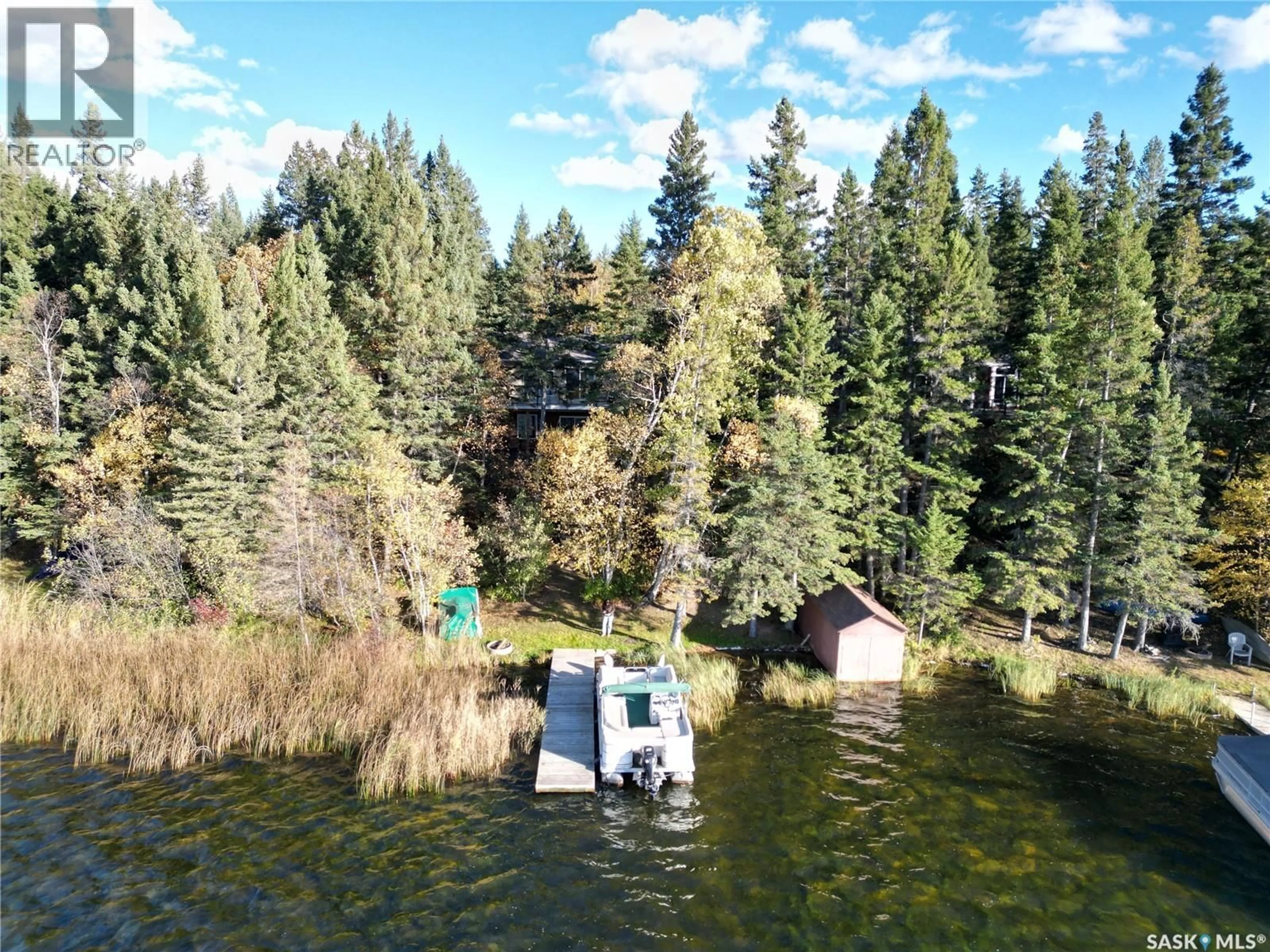 A pic from outside/outdoor area/front of a property/back of a property/a pic from drone, water/lake/river/ocean view for 1201 KINGFISHER DRIVE, Canwood Rm No. 494 Saskatchewan S0J1X0
