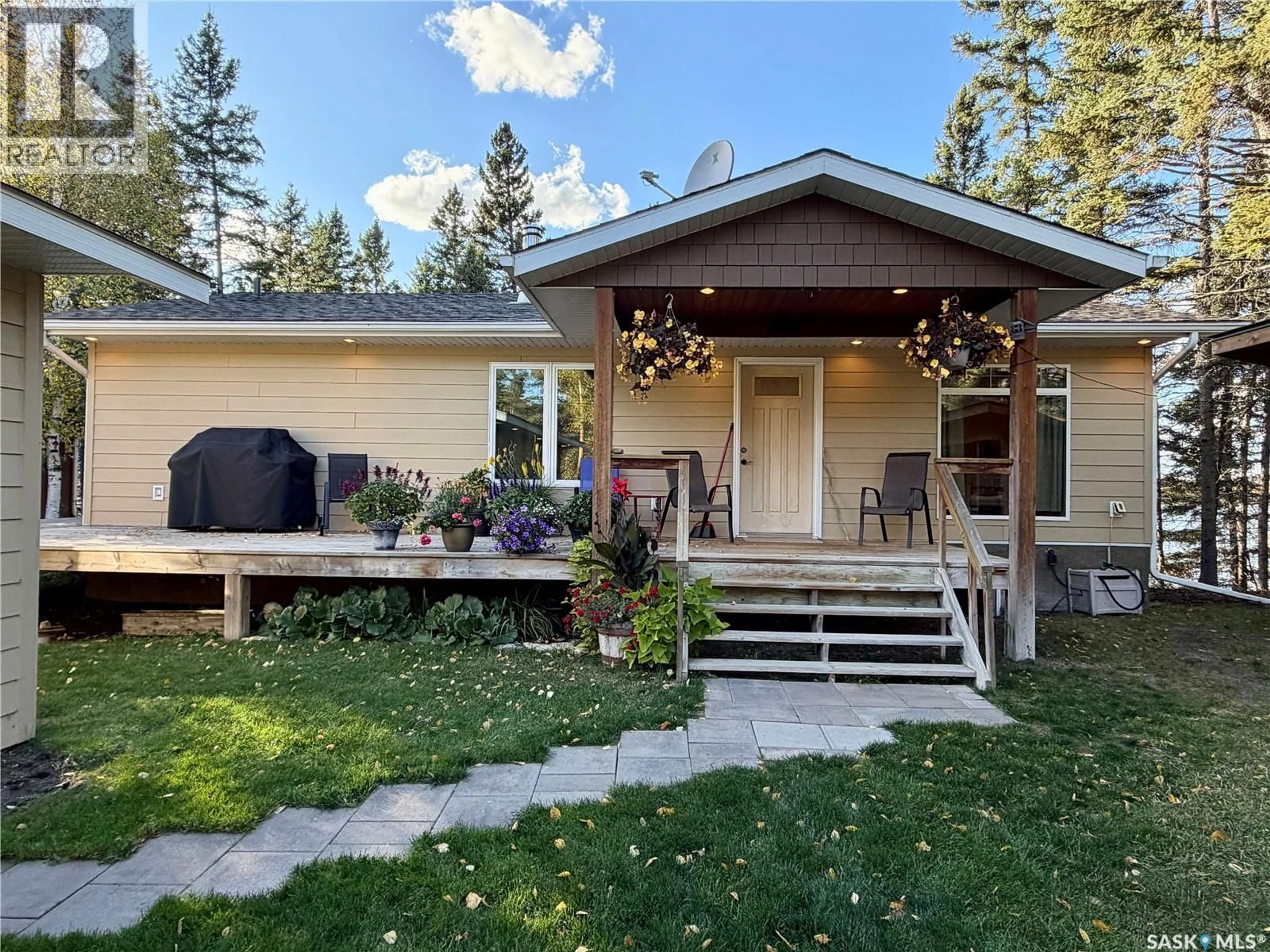 Home with vinyl exterior material, street for 1201 KINGFISHER DRIVE, Canwood Rm No. 494 Saskatchewan S0J1X0