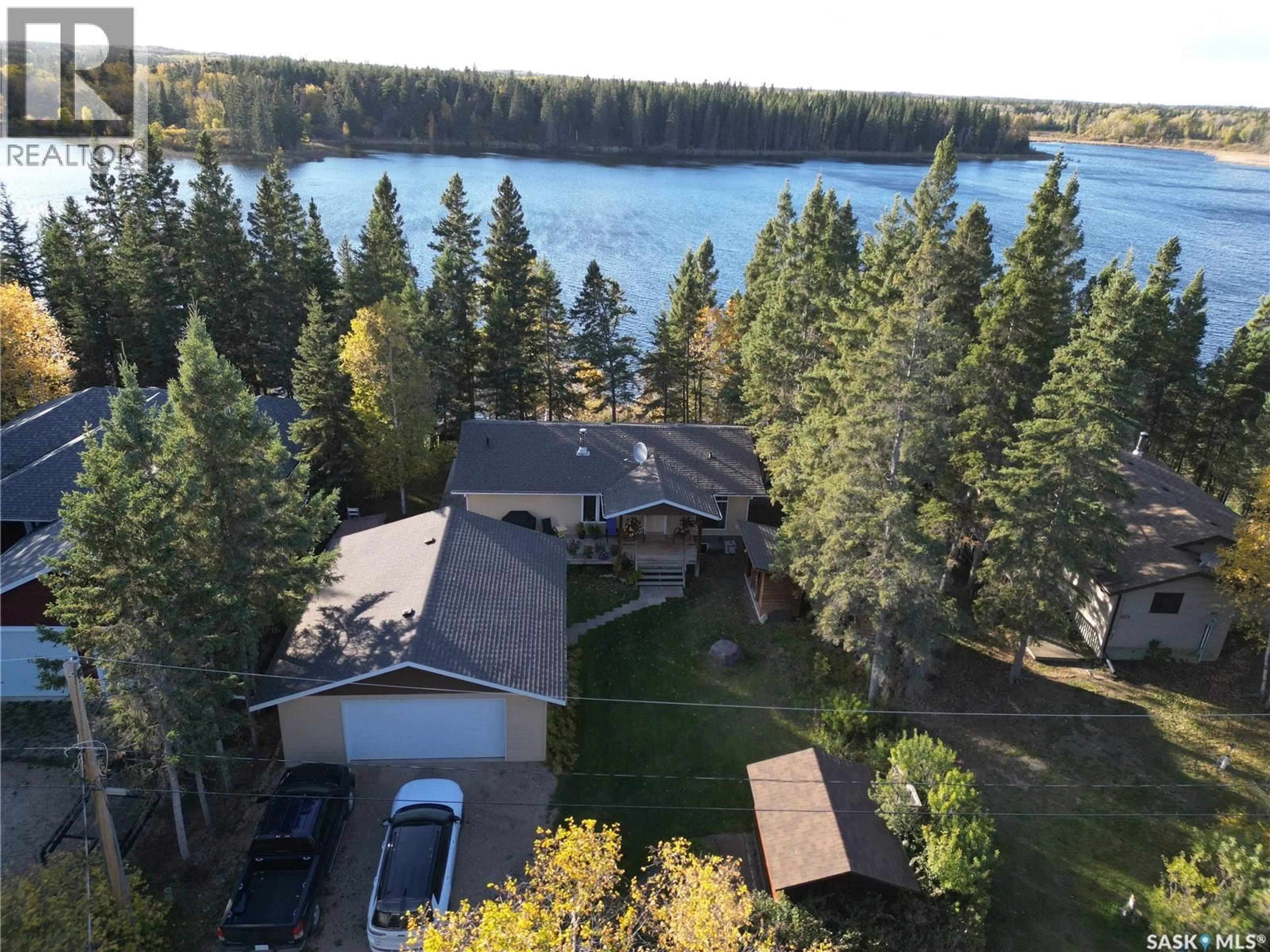 A pic from outside/outdoor area/front of a property/back of a property/a pic from drone, water/lake/river/ocean view for 1201 KINGFISHER DRIVE, Canwood Rm No. 494 Saskatchewan S0J1X0