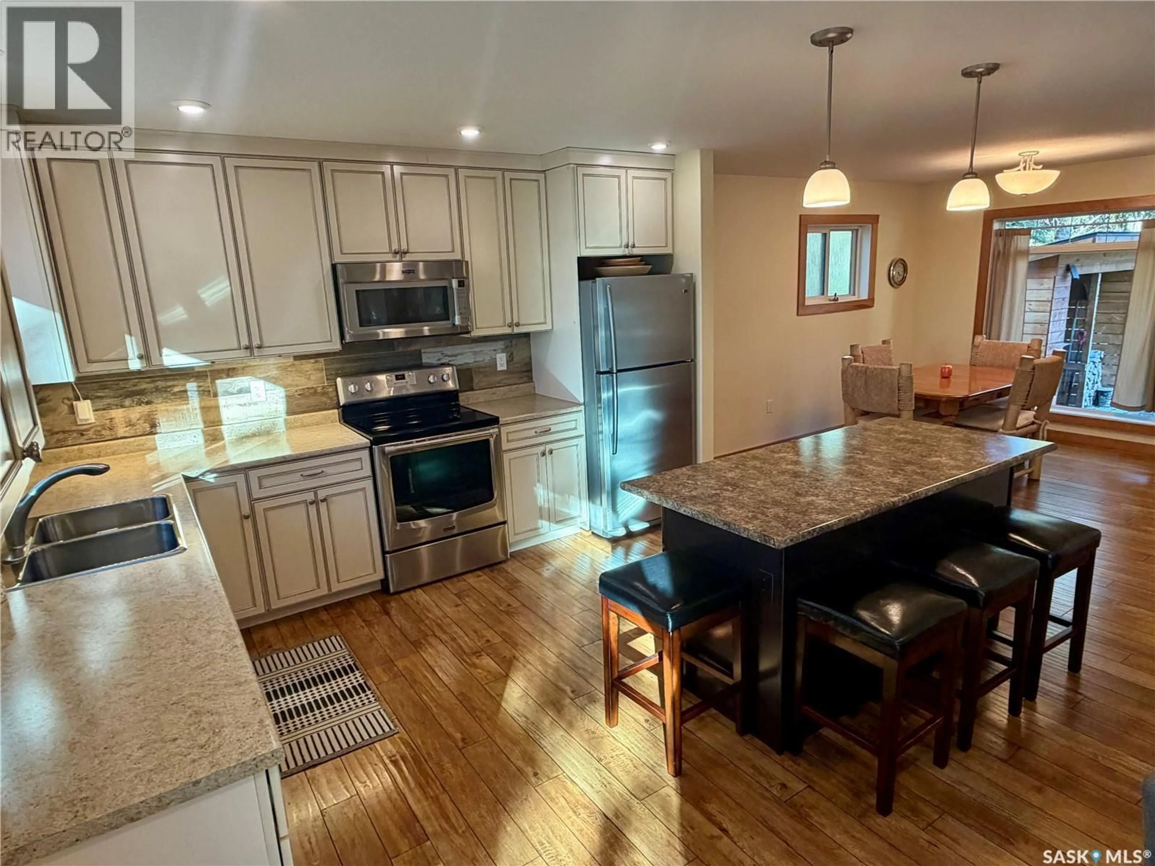 Open concept kitchen, unknown for 1201 KINGFISHER DRIVE, Canwood Rm No. 494 Saskatchewan S0J1X0