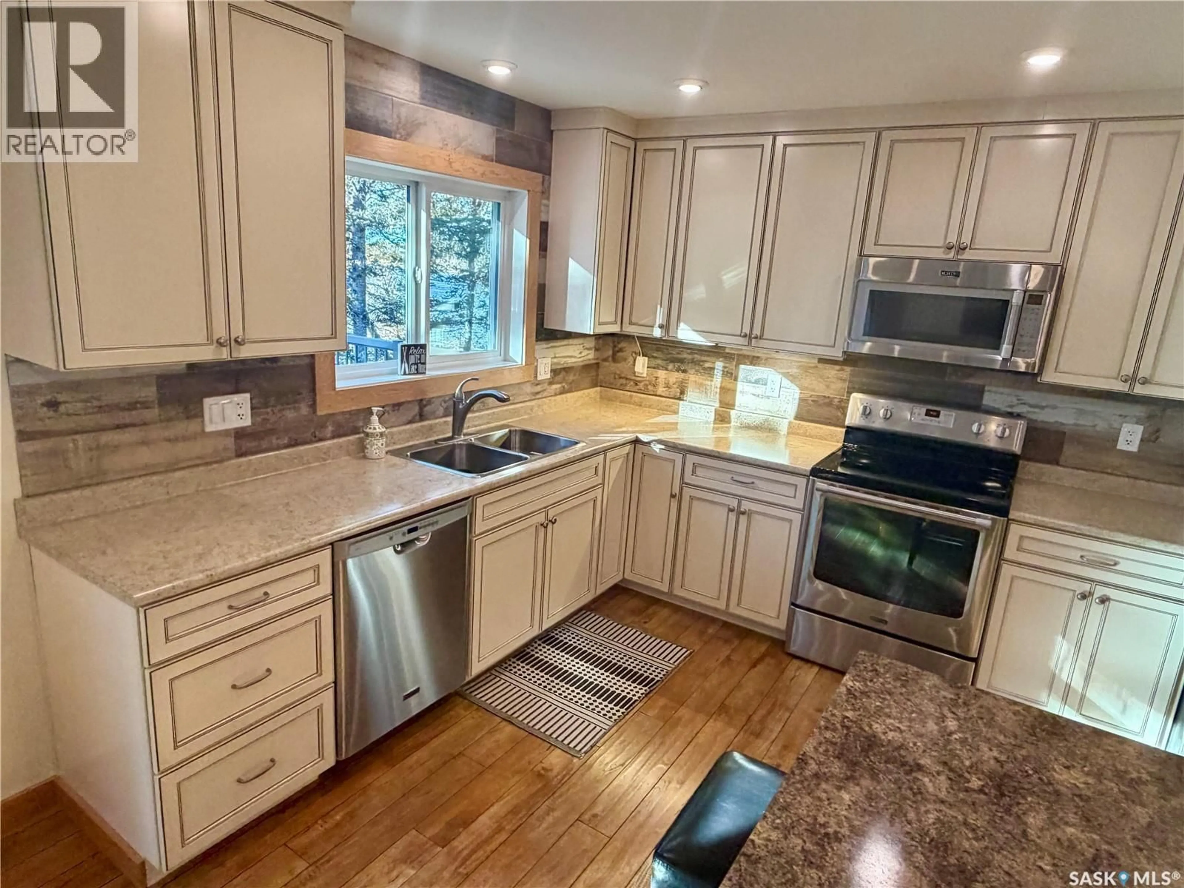 Open concept kitchen, ceramic/tile floor for 1201 KINGFISHER DRIVE, Canwood Rm No. 494 Saskatchewan S0J1X0
