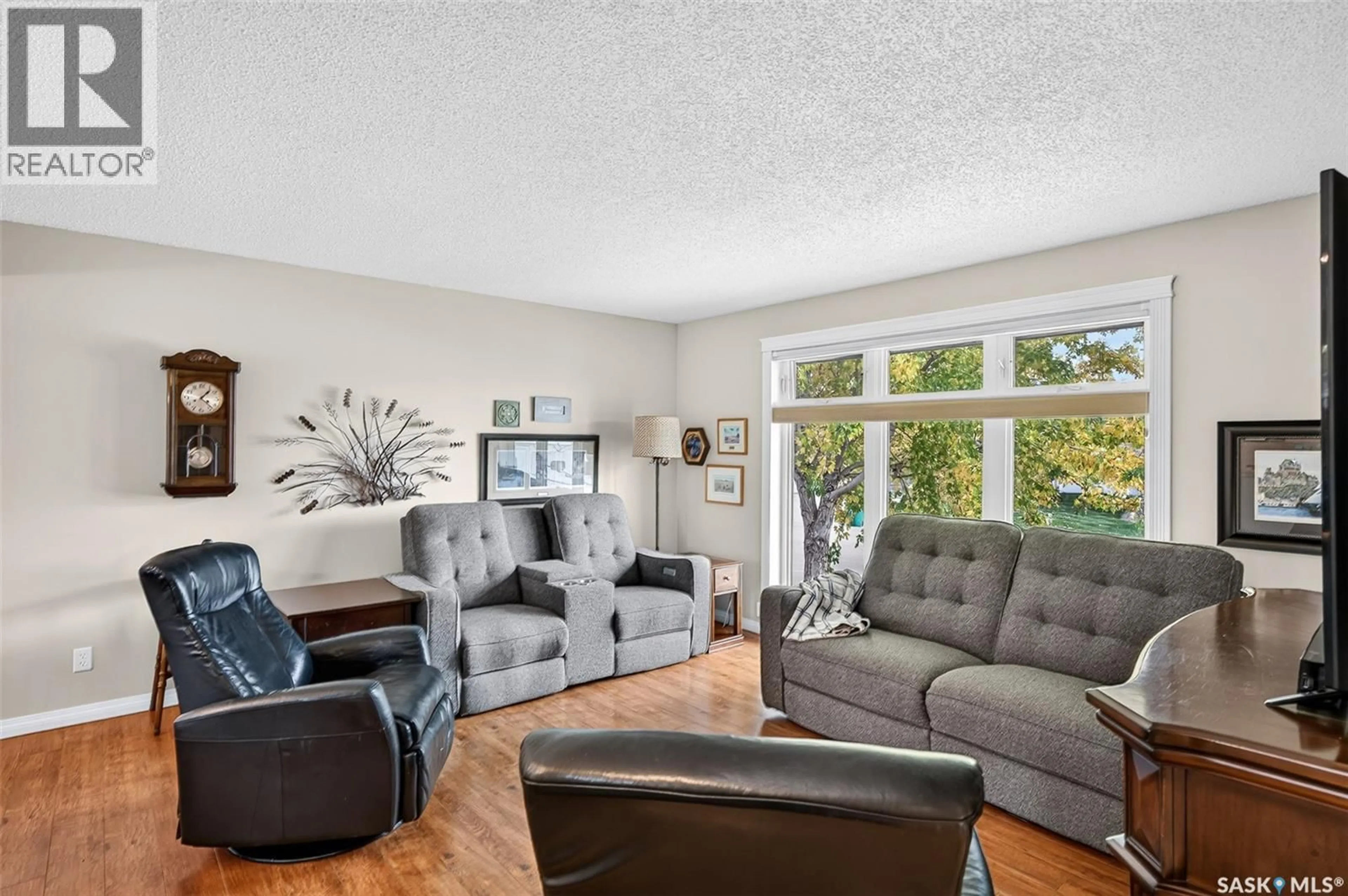 Living room with furniture, unknown for 66 EDELWEISS CRESCENT, Moose Jaw Saskatchewan S6J1E5