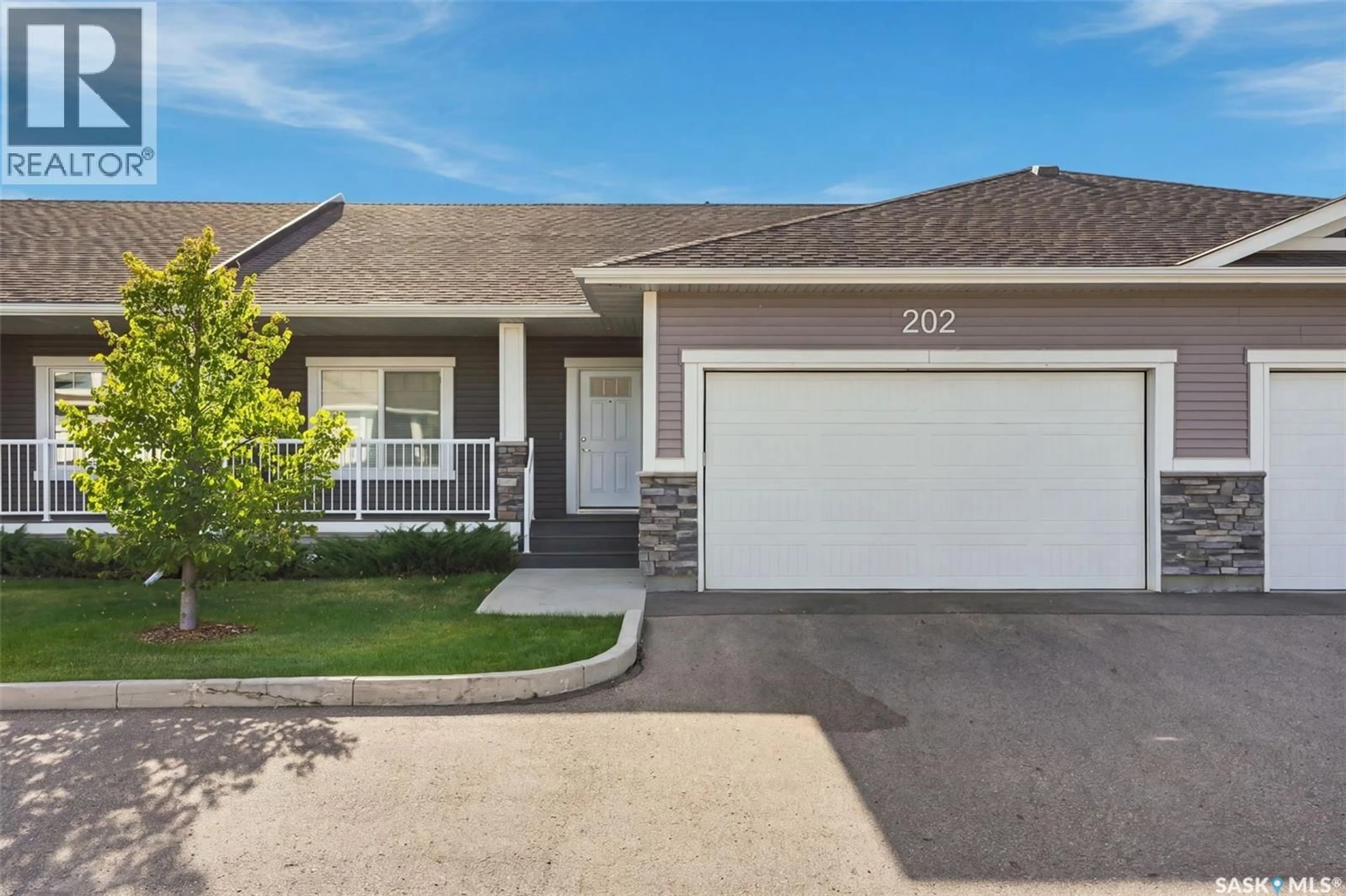 Home with vinyl exterior material, street for 202 - 1200 PARR HILL DRIVE, Martensville Saskatchewan S0K2T1