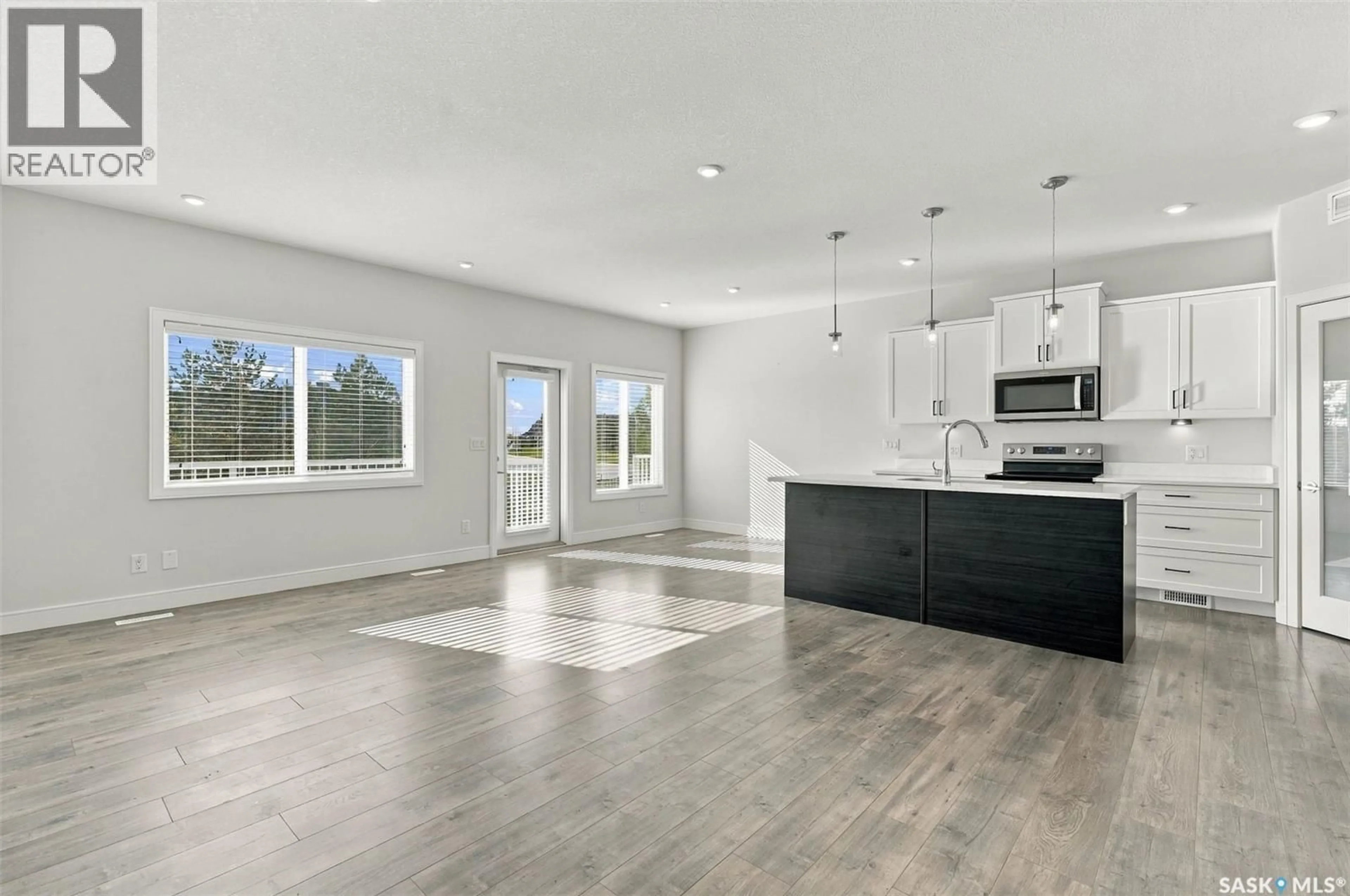 Open concept kitchen, ceramic/tile floor for 202 - 1200 PARR HILL DRIVE, Martensville Saskatchewan S0K2T1