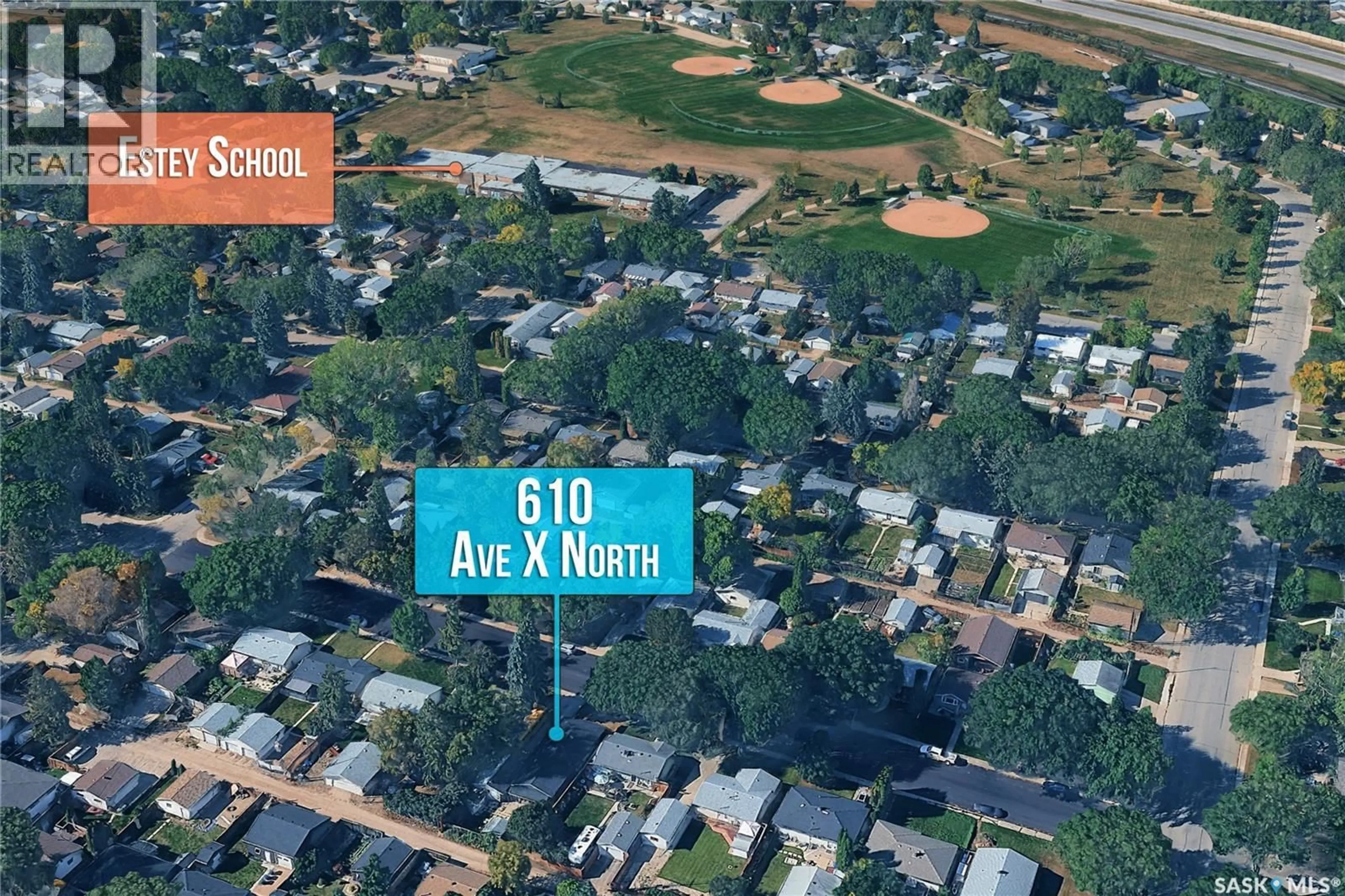 A pic from outside/outdoor area/front of a property/back of a property/a pic from drone, street for 610 X AVENUE, Saskatoon Saskatchewan S7L3K2
