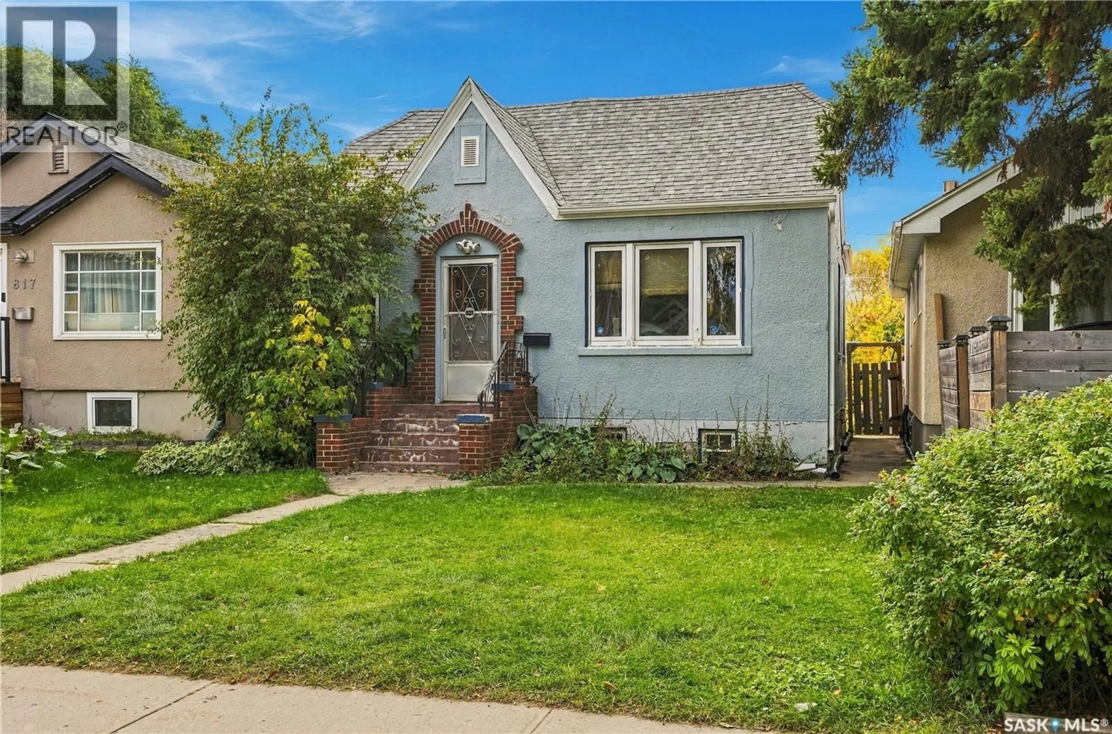 Home with brick exterior material, street for 821 COLLEGE AVENUE, Regina Saskatchewan S4N0Y1