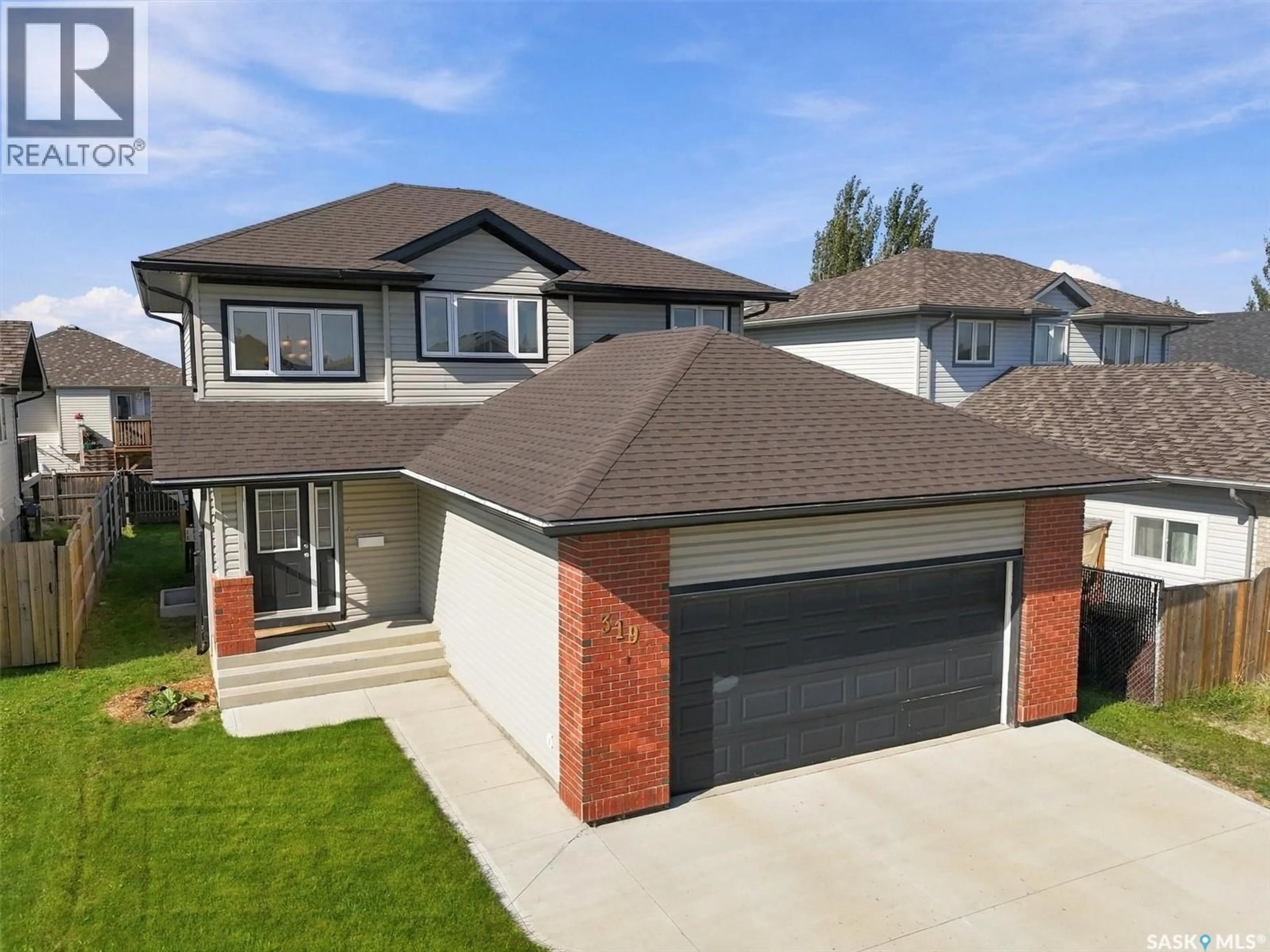 Home with brick exterior material, street for 319 ALLWOOD CRESCENT, Saskatoon Saskatchewan S7R0A4
