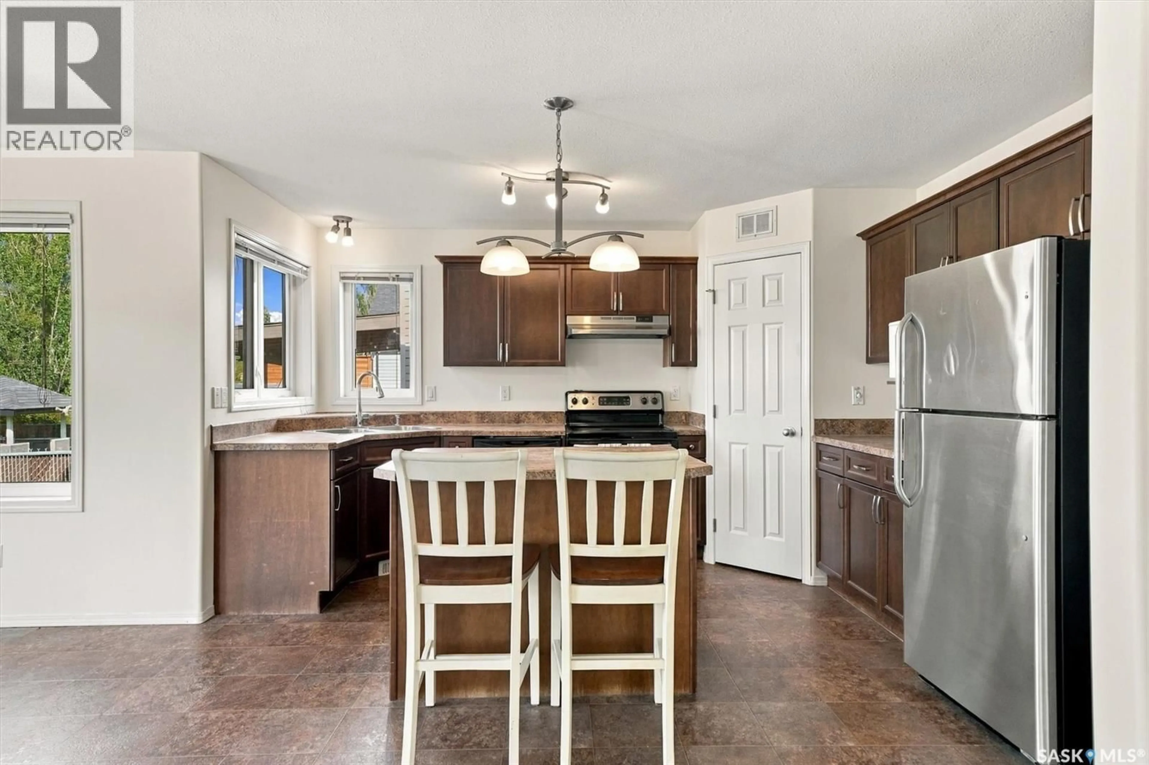 Open concept kitchen, ceramic/tile floor for 319 ALLWOOD CRESCENT, Saskatoon Saskatchewan S7R0A4