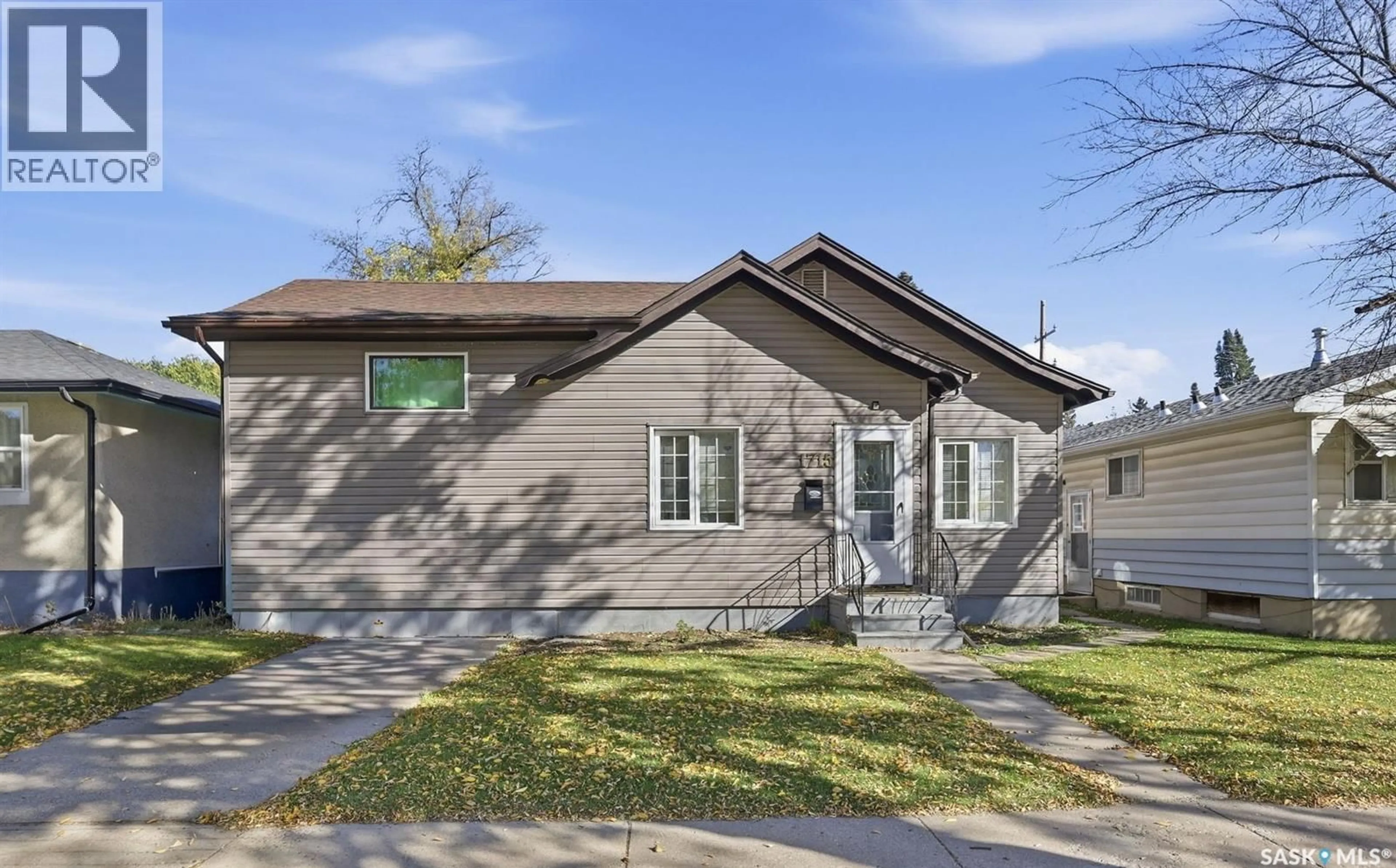 Home with vinyl exterior material, street for 1715 BROADWAY AVENUE, Saskatoon Saskatchewan S7H2B4