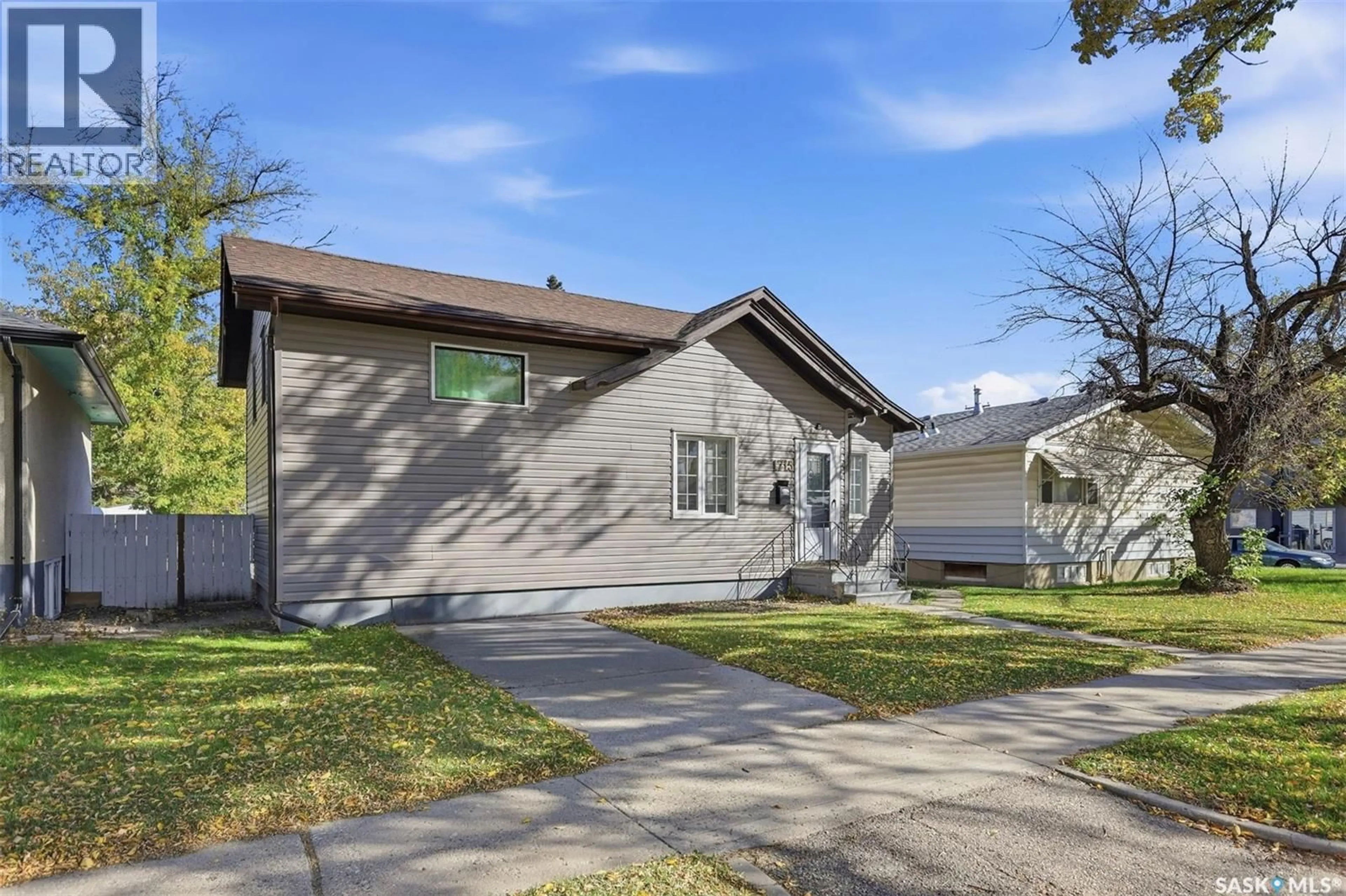 Home with vinyl exterior material, street for 1715 BROADWAY AVENUE, Saskatoon Saskatchewan S7H2B4