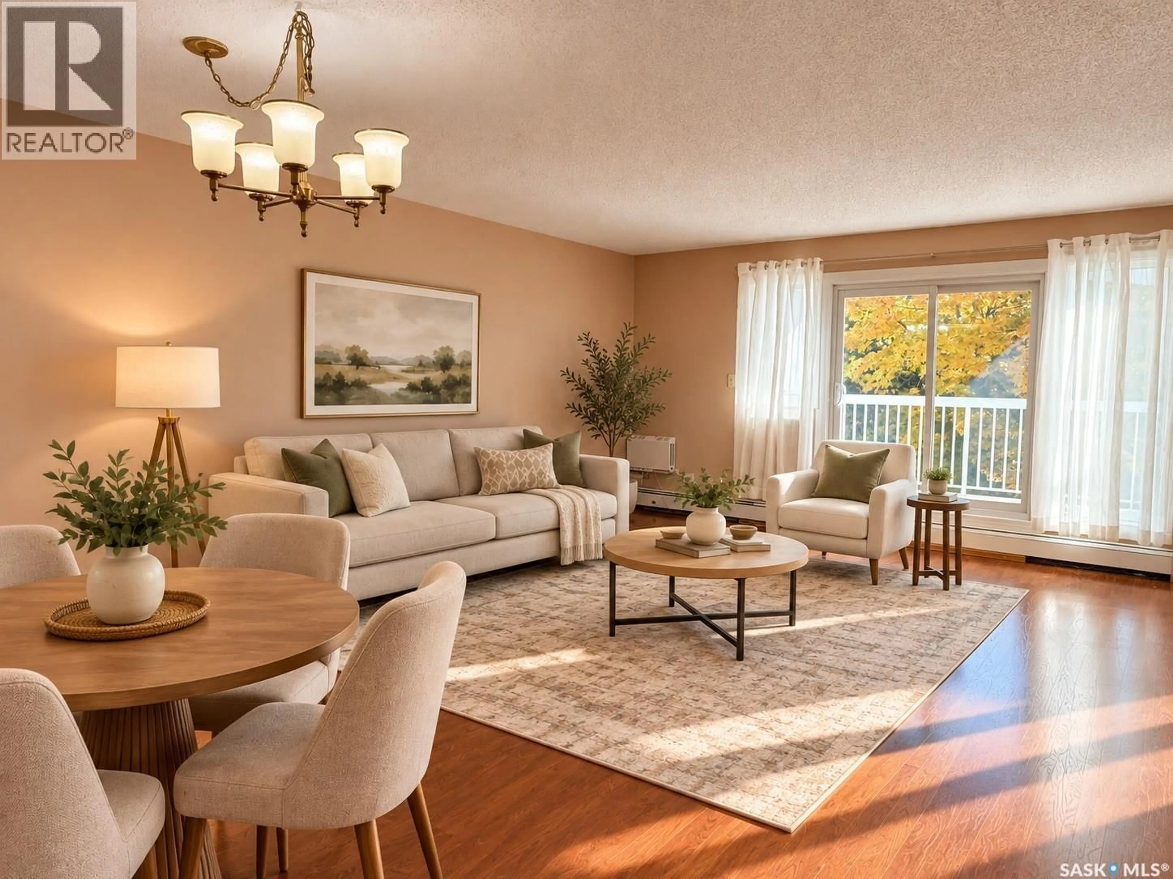 Living room with furniture, wood/laminate floor for 960 - 219 ASSINIBOINE AVENUE E, Regina Saskatchewan S4V2P8