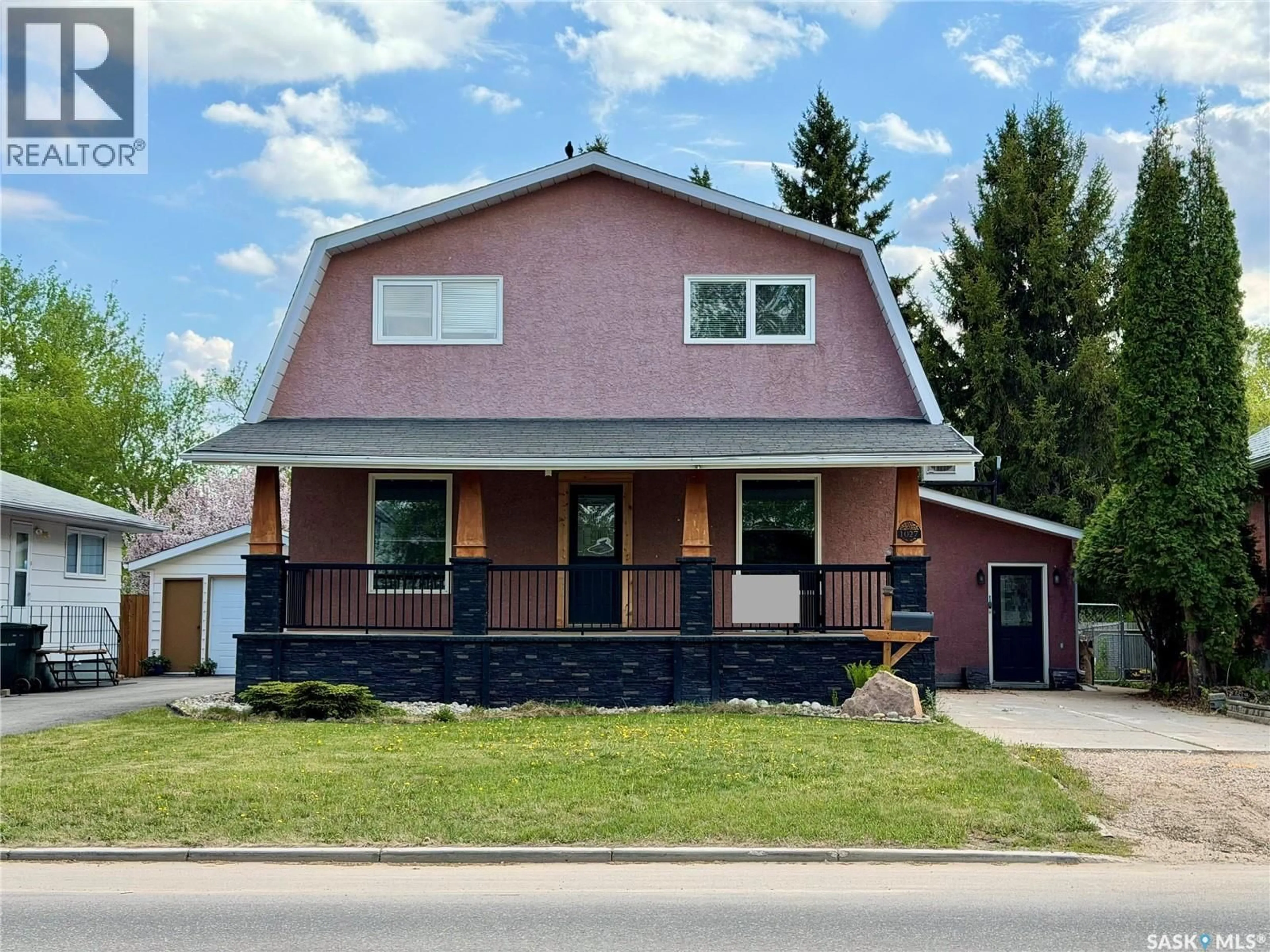 Home with brick exterior material, street for 1027 4TH STREET, Prince Albert Saskatchewan S6V0L1