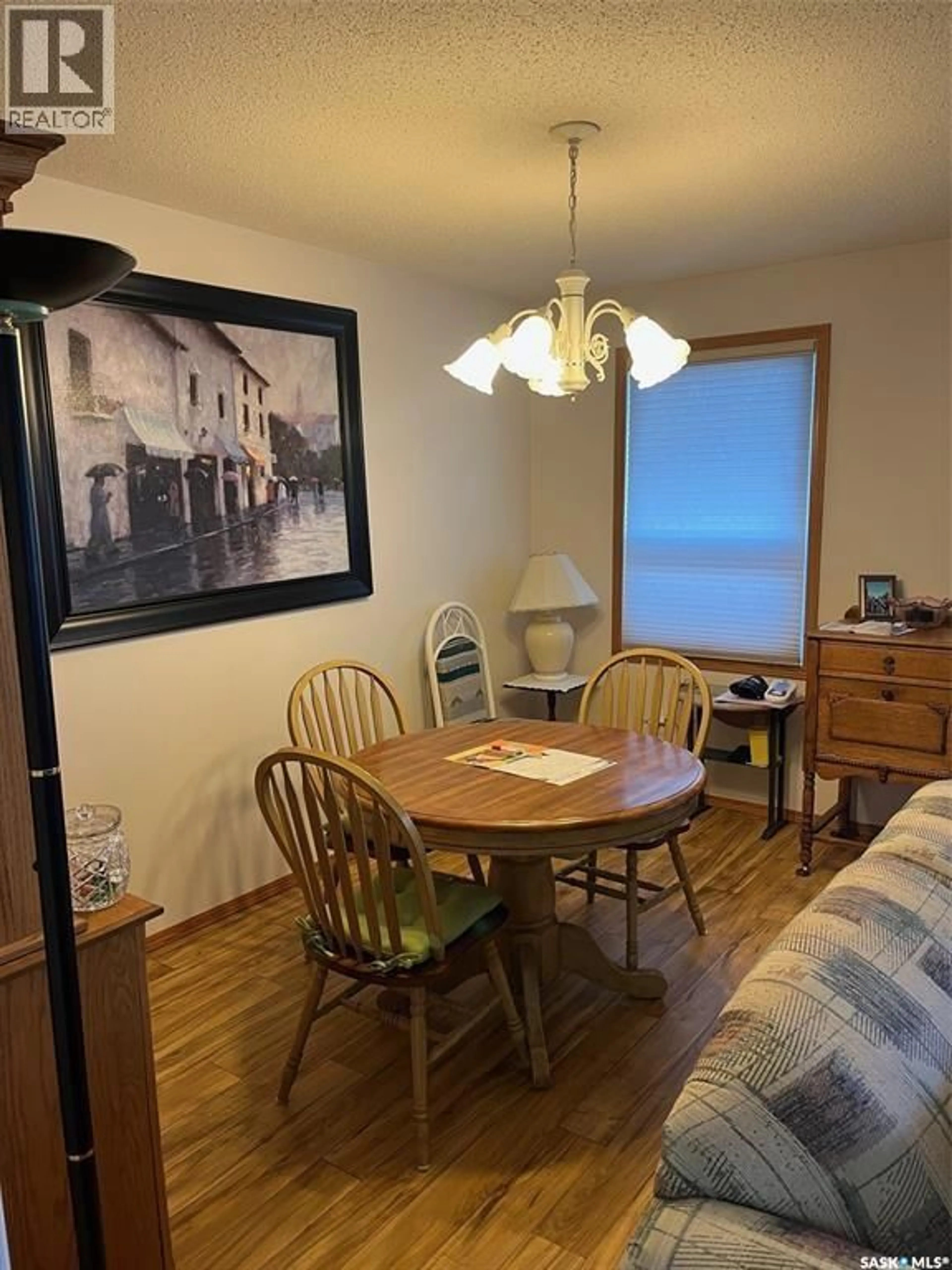 Dining room, wood/laminate floor for 101 - 1226 THIRD STREET, Estevan Saskatchewan S4A0R9