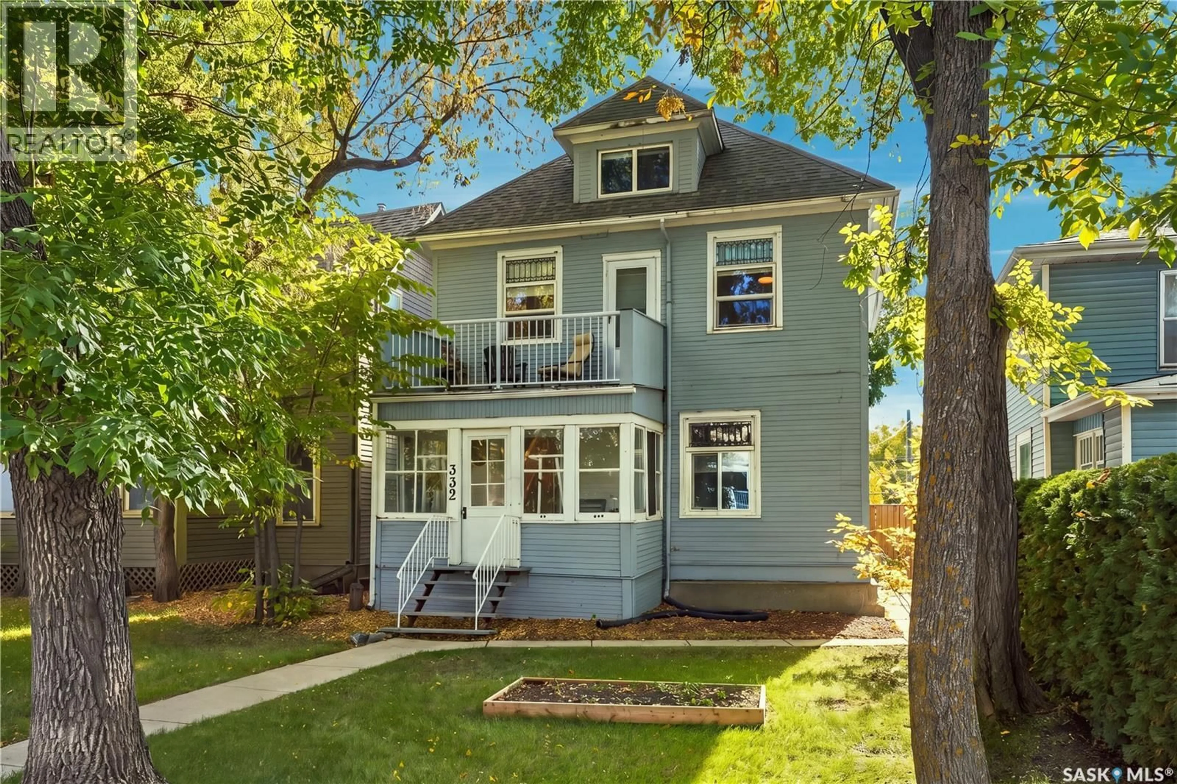 Home with vinyl exterior material, street for 332 10TH STREET, Saskatoon Saskatchewan S7N0C7