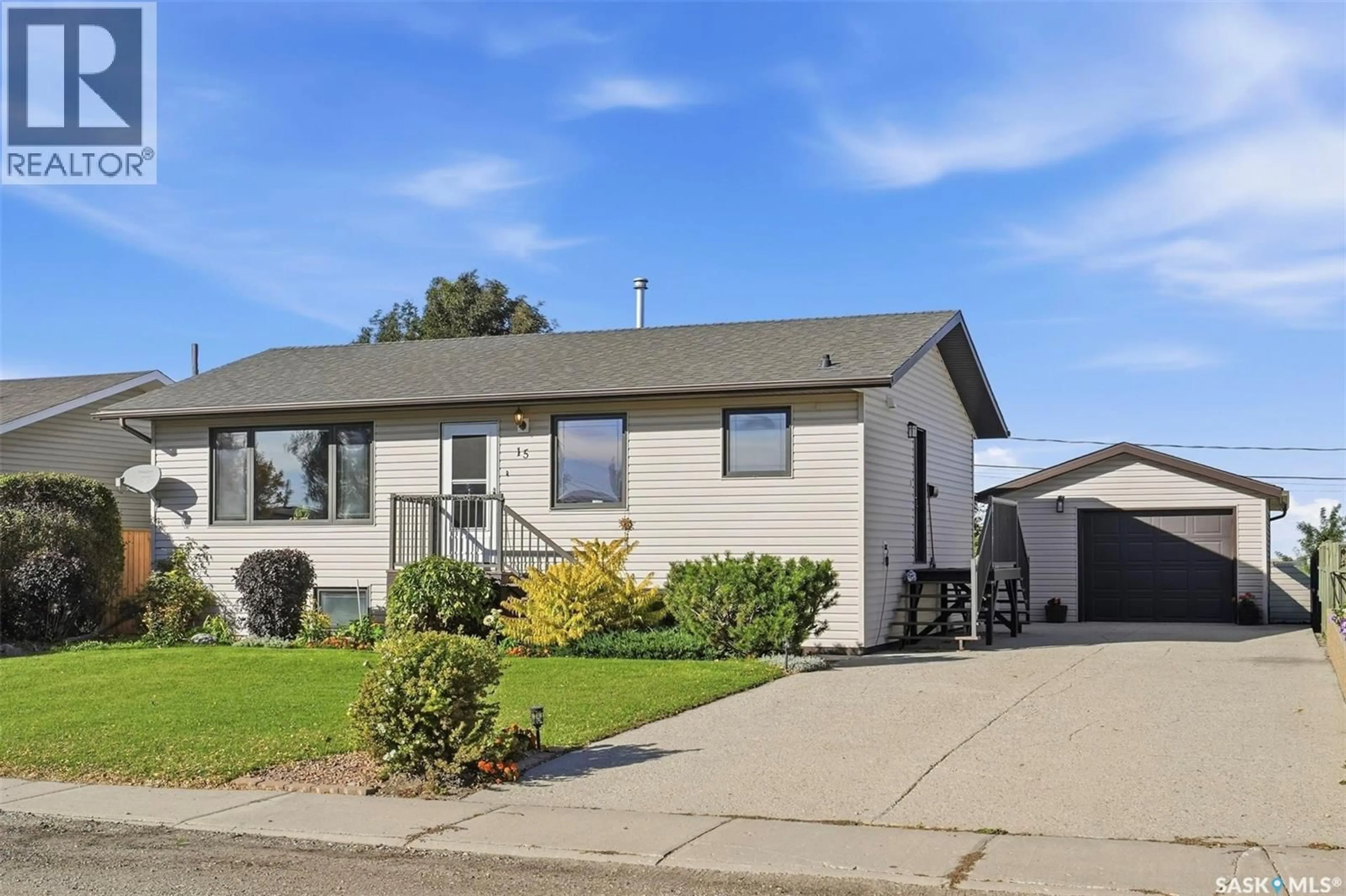 Home with vinyl exterior material, street for 15 BLAKE CRESCENT, Aberdeen Saskatchewan S0K0A0