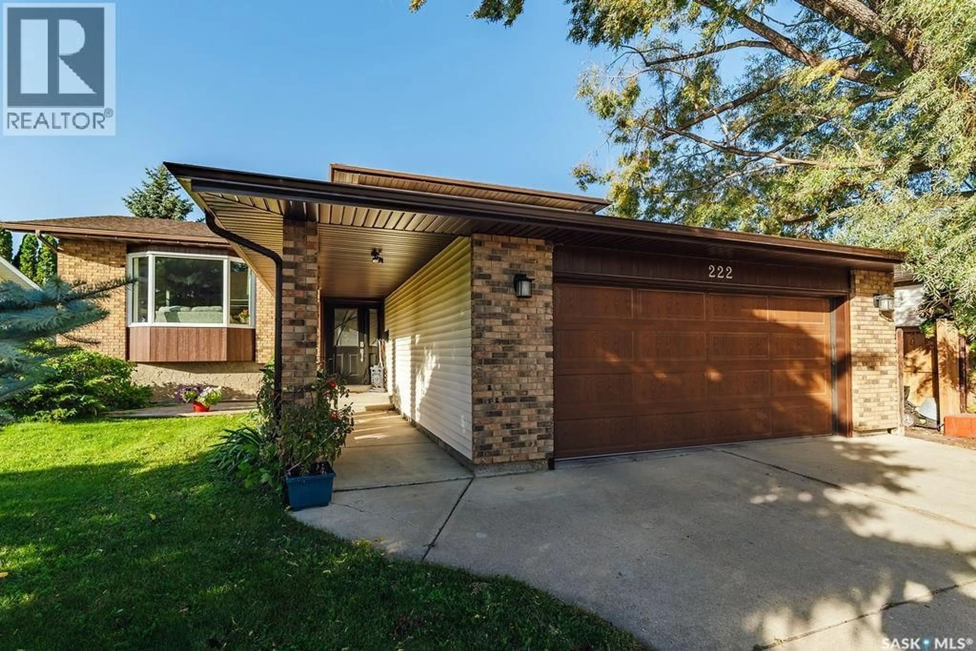 Home with brick exterior material, street for 222 GATHERCOLE CRESCENT, Saskatoon Saskatchewan S7K7J2