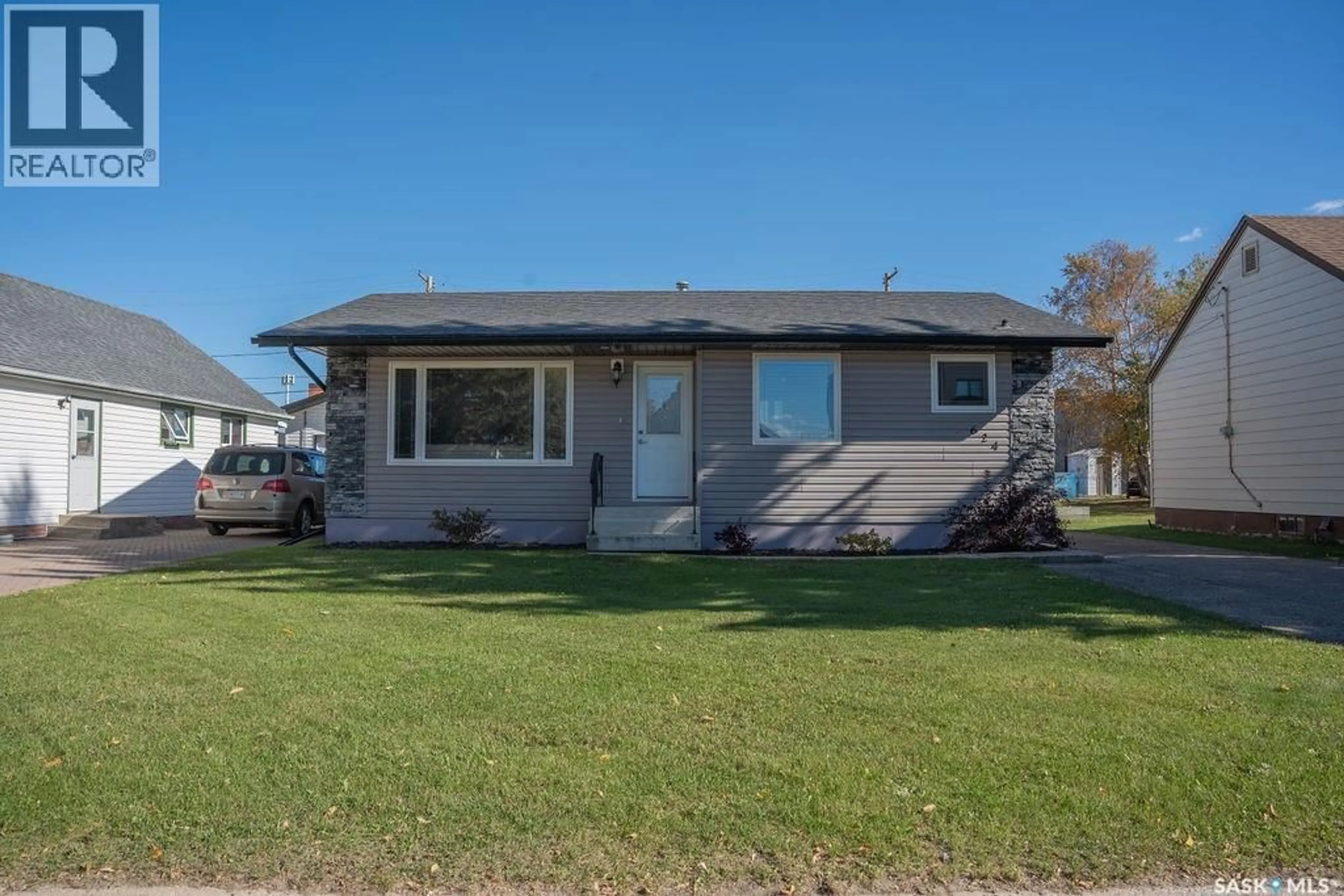 Home with vinyl exterior material, street for 624 10TH STREET, Humboldt Saskatchewan S0K2A0