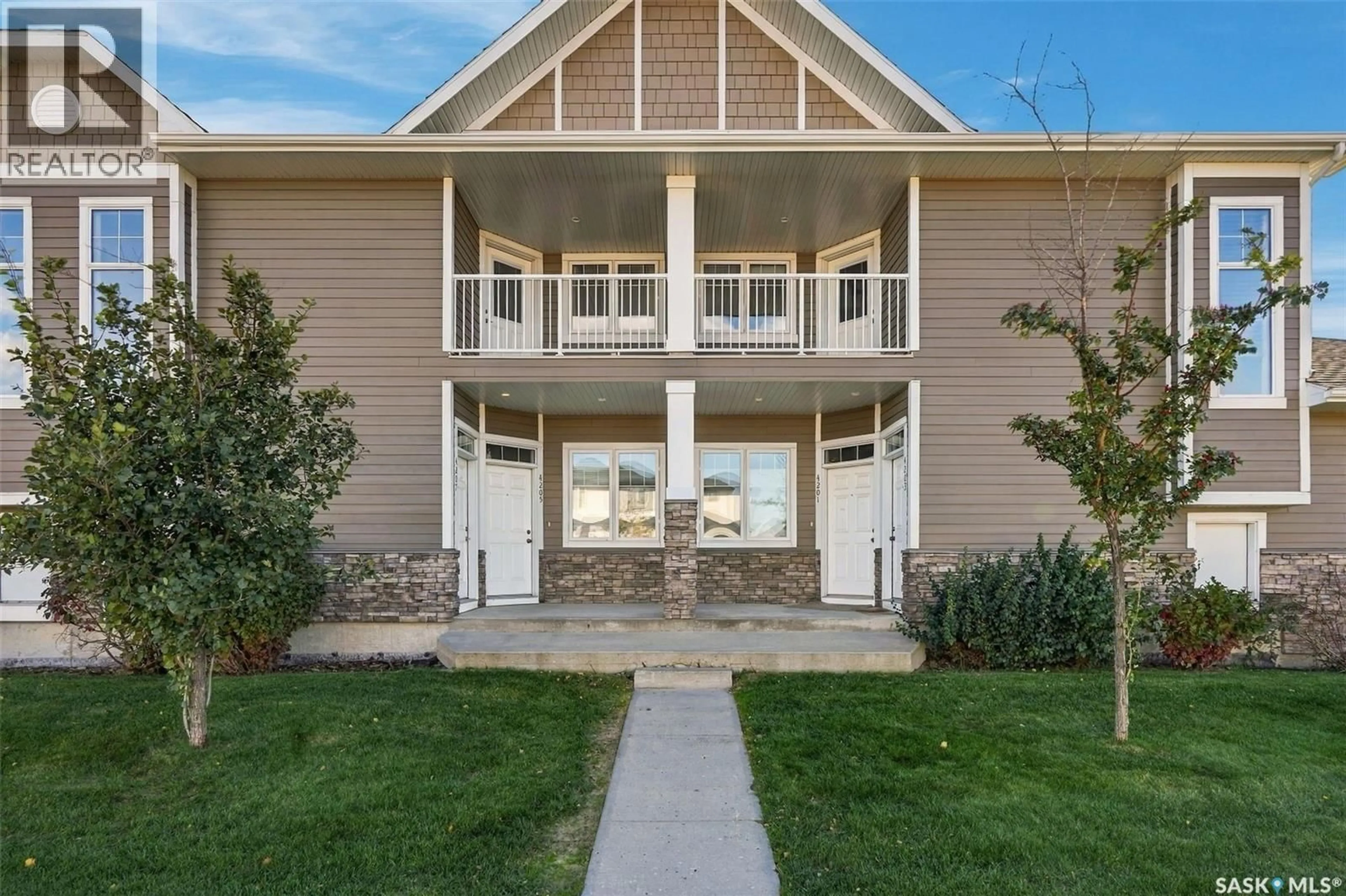 Home with vinyl exterior material, mountain view for E - 4207 GREEN APPLE DRIVE, Regina Saskatchewan S4V1M6