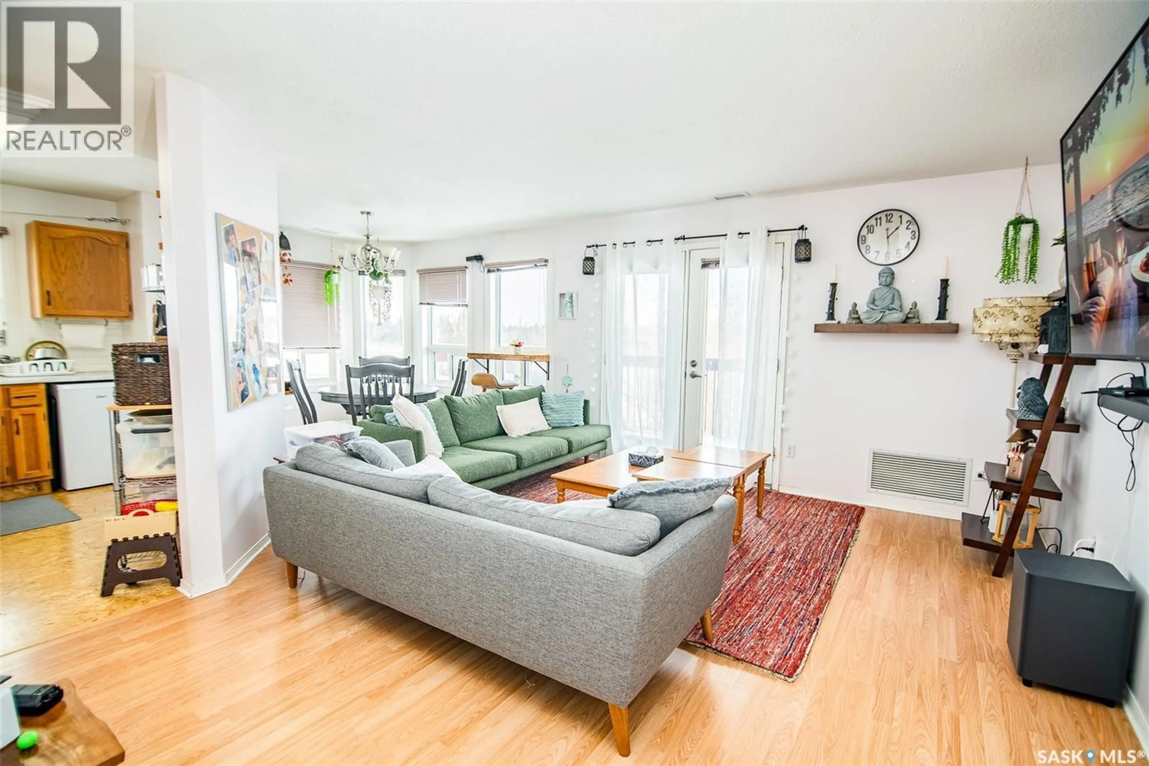 Living room with furniture, wood/laminate floor for C2 - 532 RIVER STREET, Prince Albert Saskatchewan S6V0A6