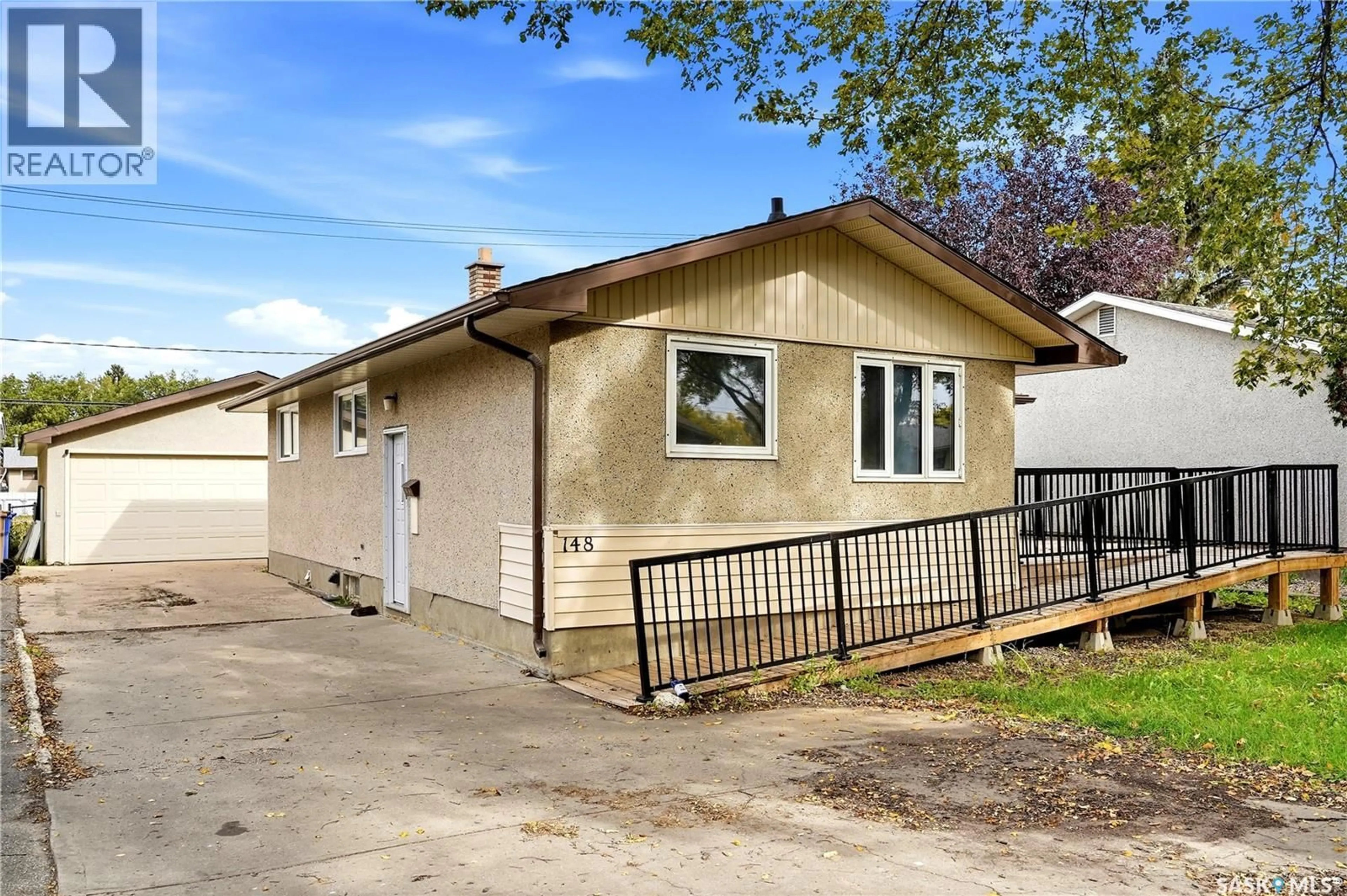 Home with vinyl exterior material, street for 148 WOODWARD AVENUE, Regina Saskatchewan S4R3H4
