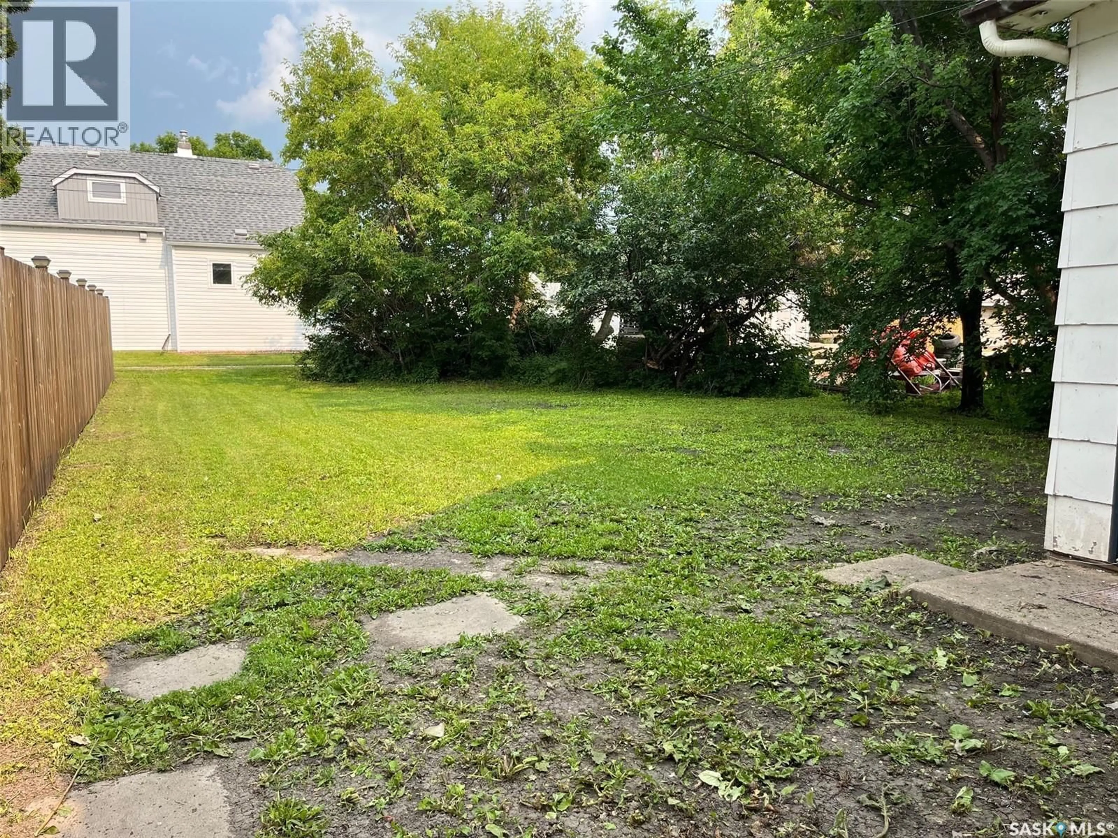 A pic from outside/outdoor area/front of a property/back of a property/a pic from drone, street for 704 WEST AVENUE, Kamsack Saskatchewan S0A1S0