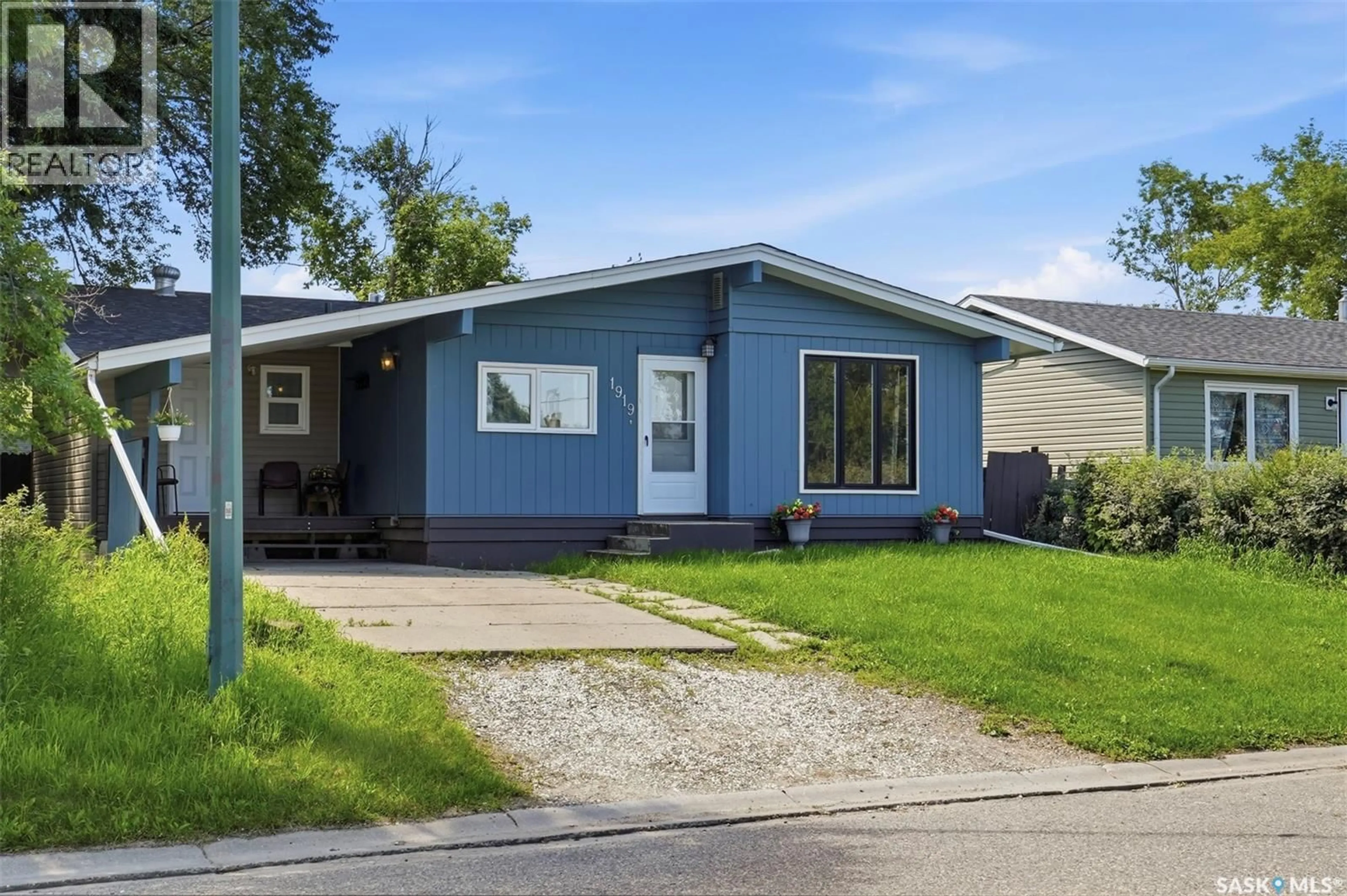 Home with vinyl exterior material, street for 1919 14TH STREET, Prince Albert Saskatchewan S6V3P3