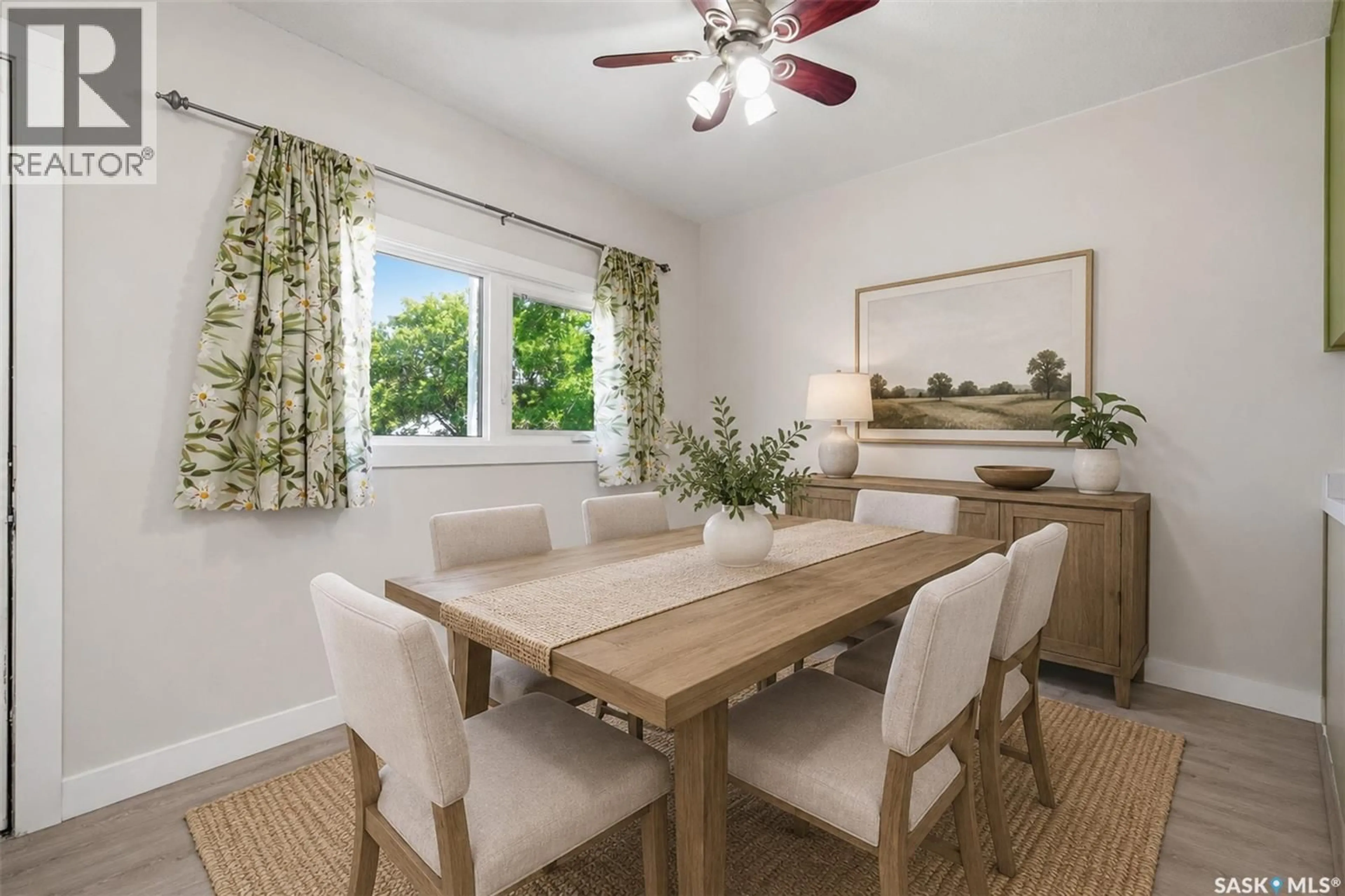 Dining room, wood/laminate floor for 1919 14TH STREET, Prince Albert Saskatchewan S6V3P3
