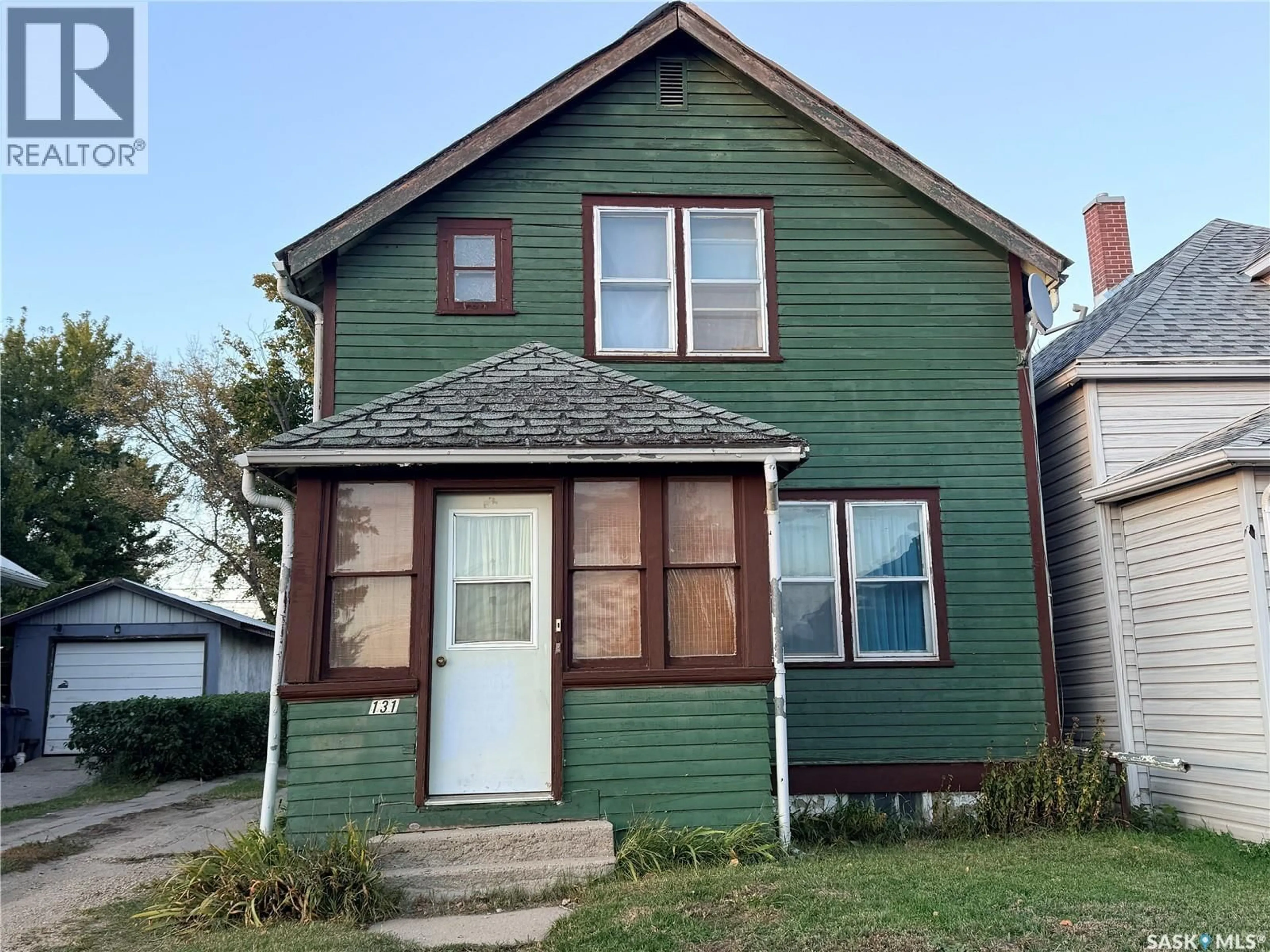 Home with vinyl exterior material, street for 131 2ND AVENUE, Biggar Saskatchewan S0K0M0
