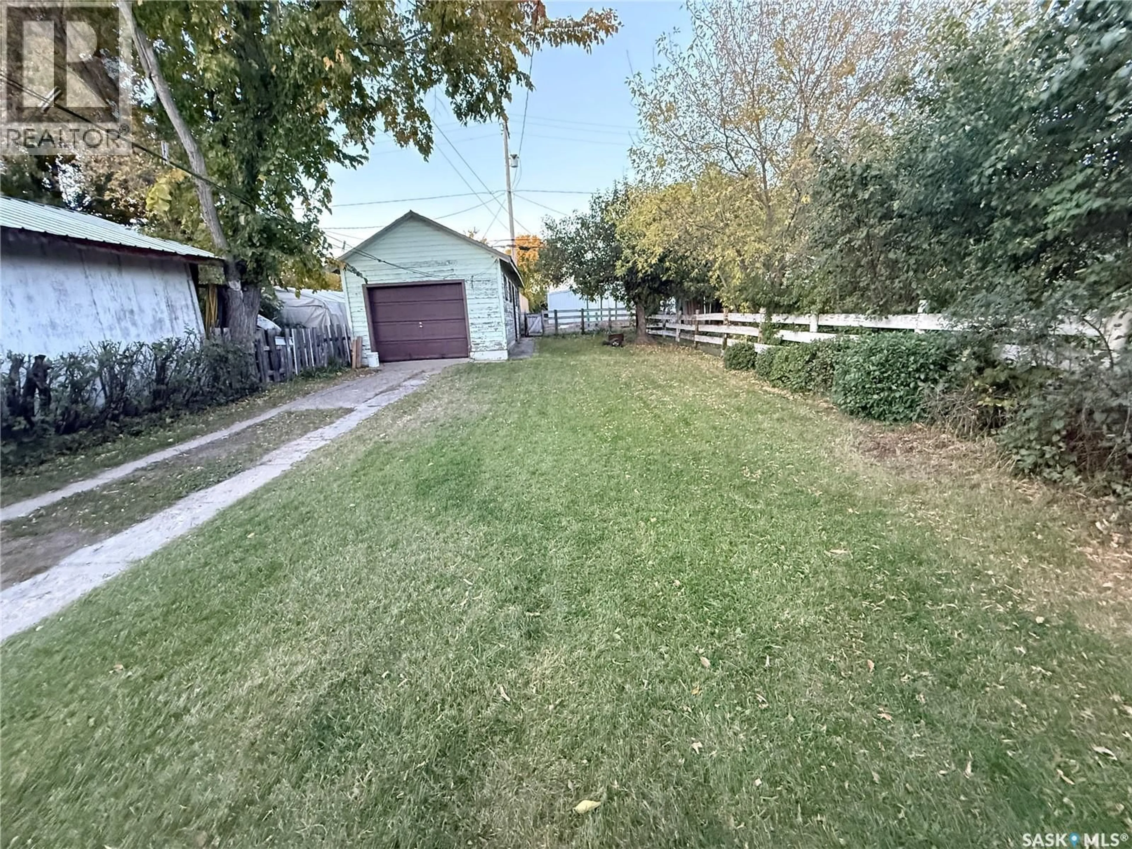 A pic from outside/outdoor area/front of a property/back of a property/a pic from drone, street for 131 2ND AVENUE, Biggar Saskatchewan S0K0M0