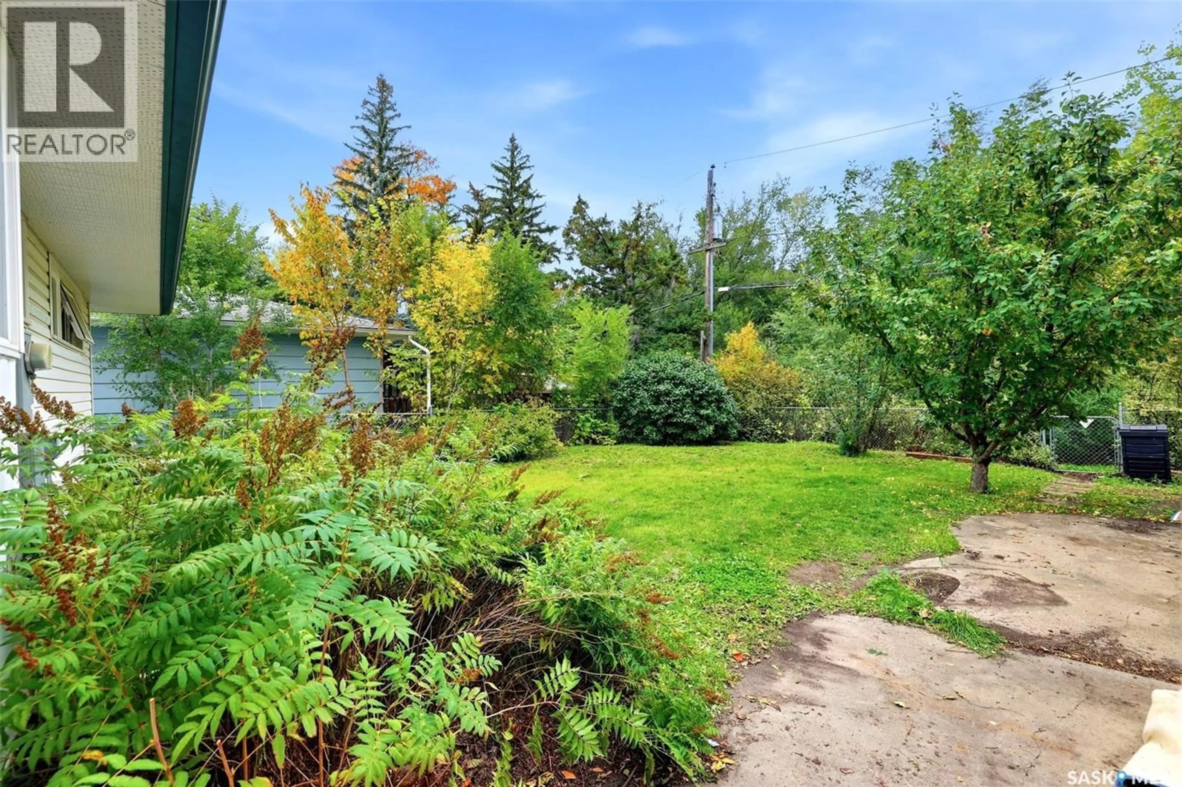 Patio, forest/trees view for 94 DARKE CRESCENT, Regina Saskatchewan S4S3X9