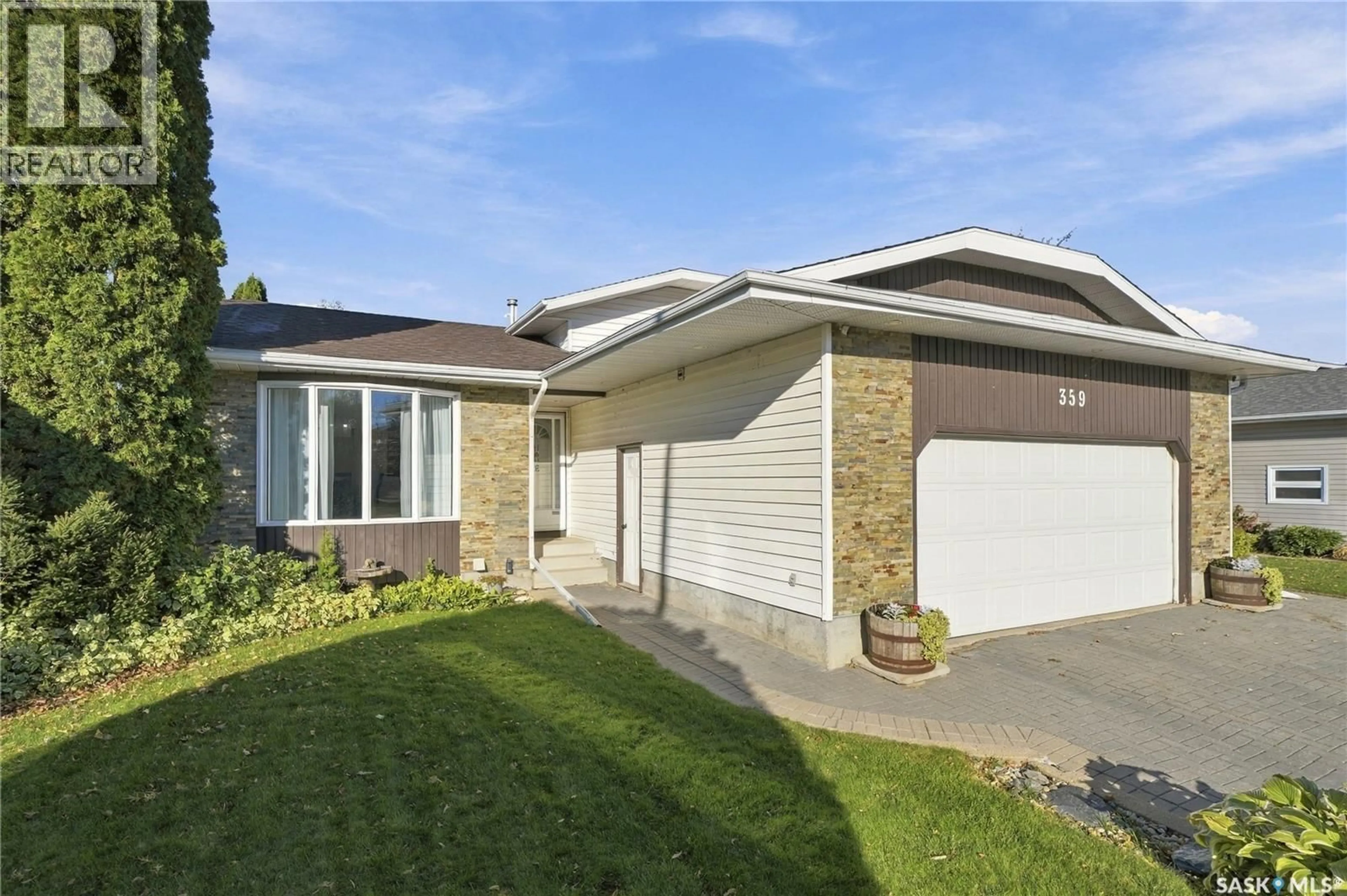 Home with vinyl exterior material, street for 359 NORDSTRUM ROAD, Saskatoon Saskatchewan S7K6P9