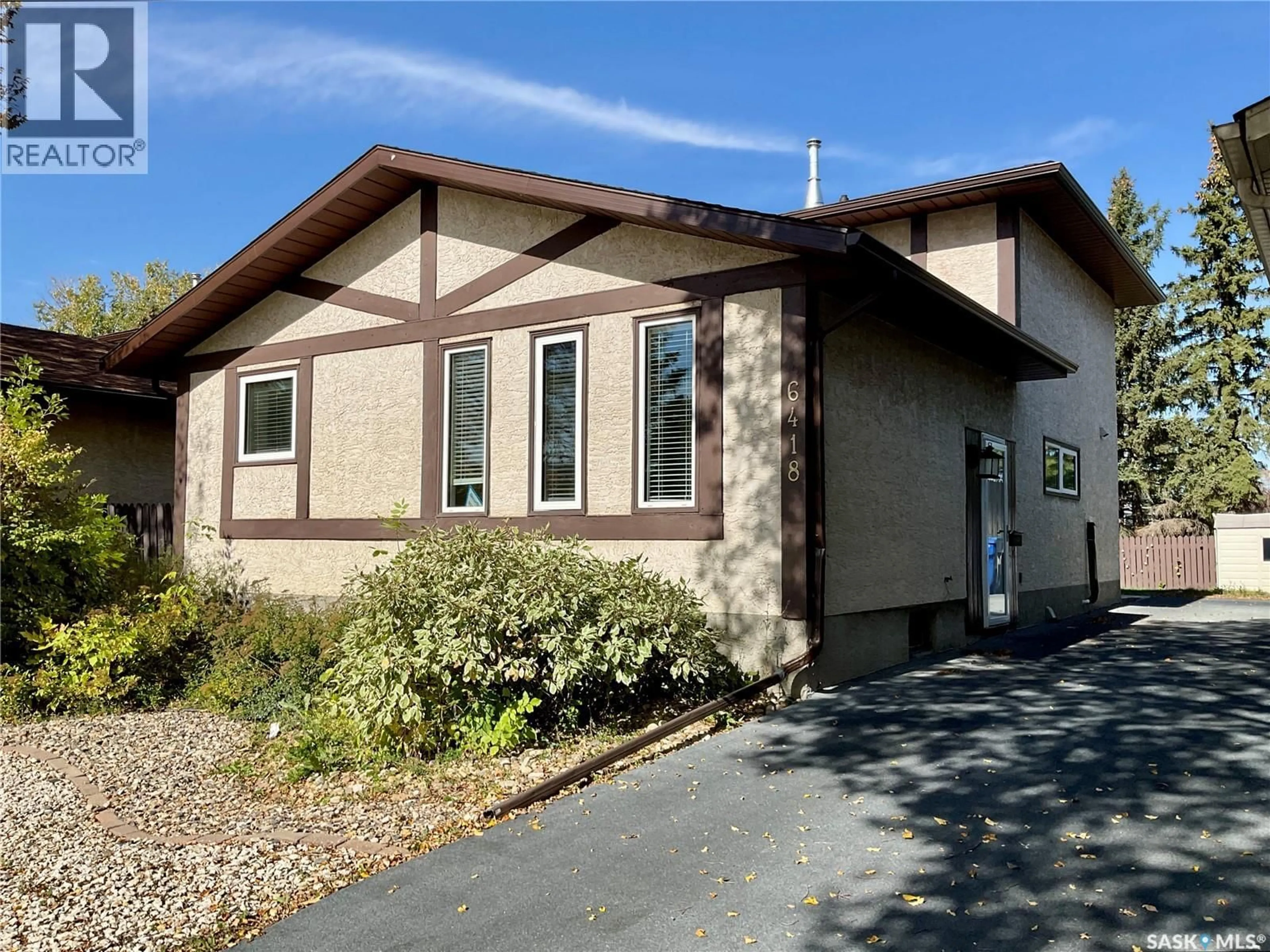 Home with vinyl exterior material, street for 6418 DALGLIESH DRIVE, Regina Saskatchewan S4X2R2