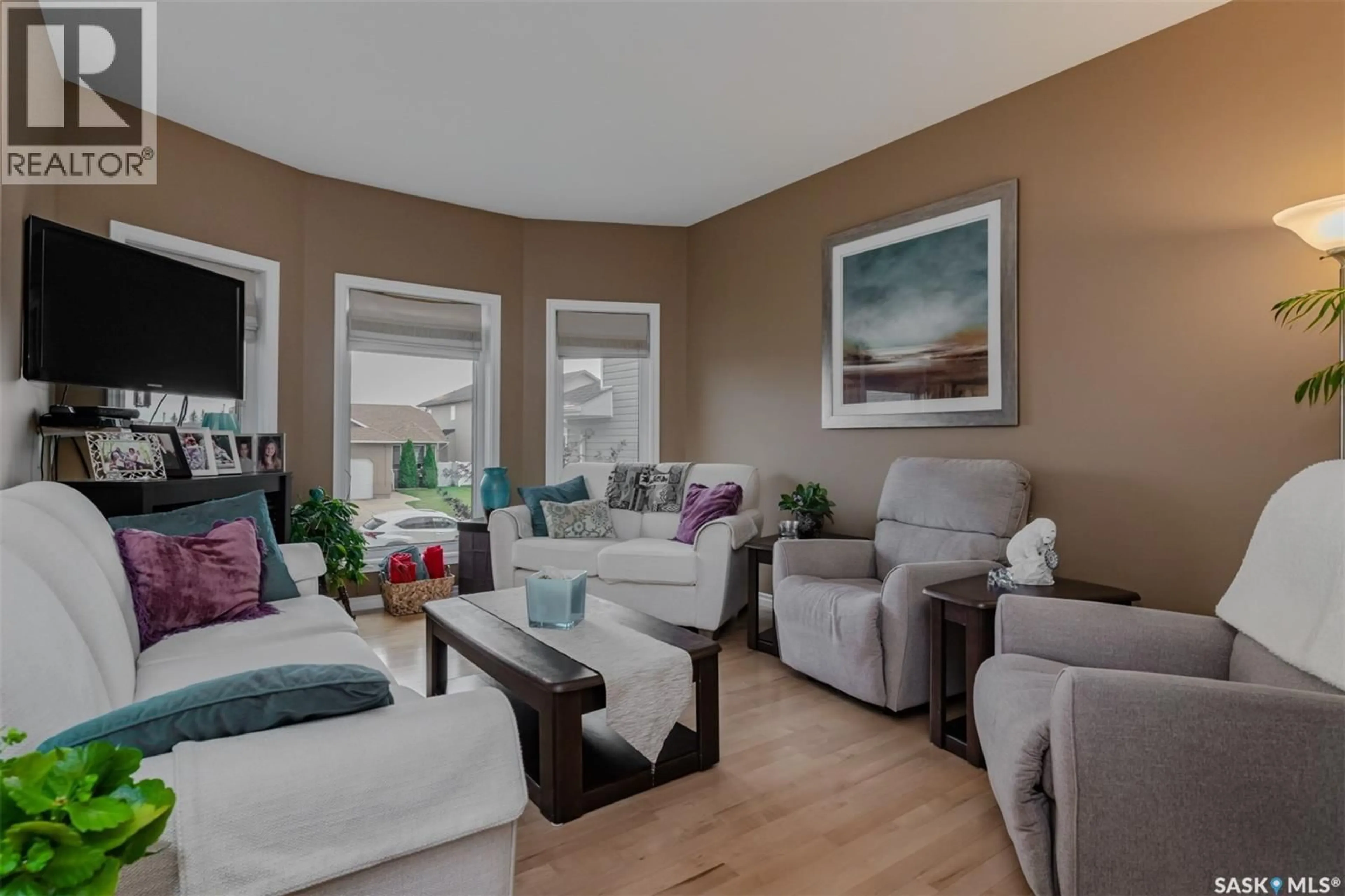 Living room with furniture, unknown for 322 NICKLAUS DRIVE, Warman Saskatchewan S0K0A1