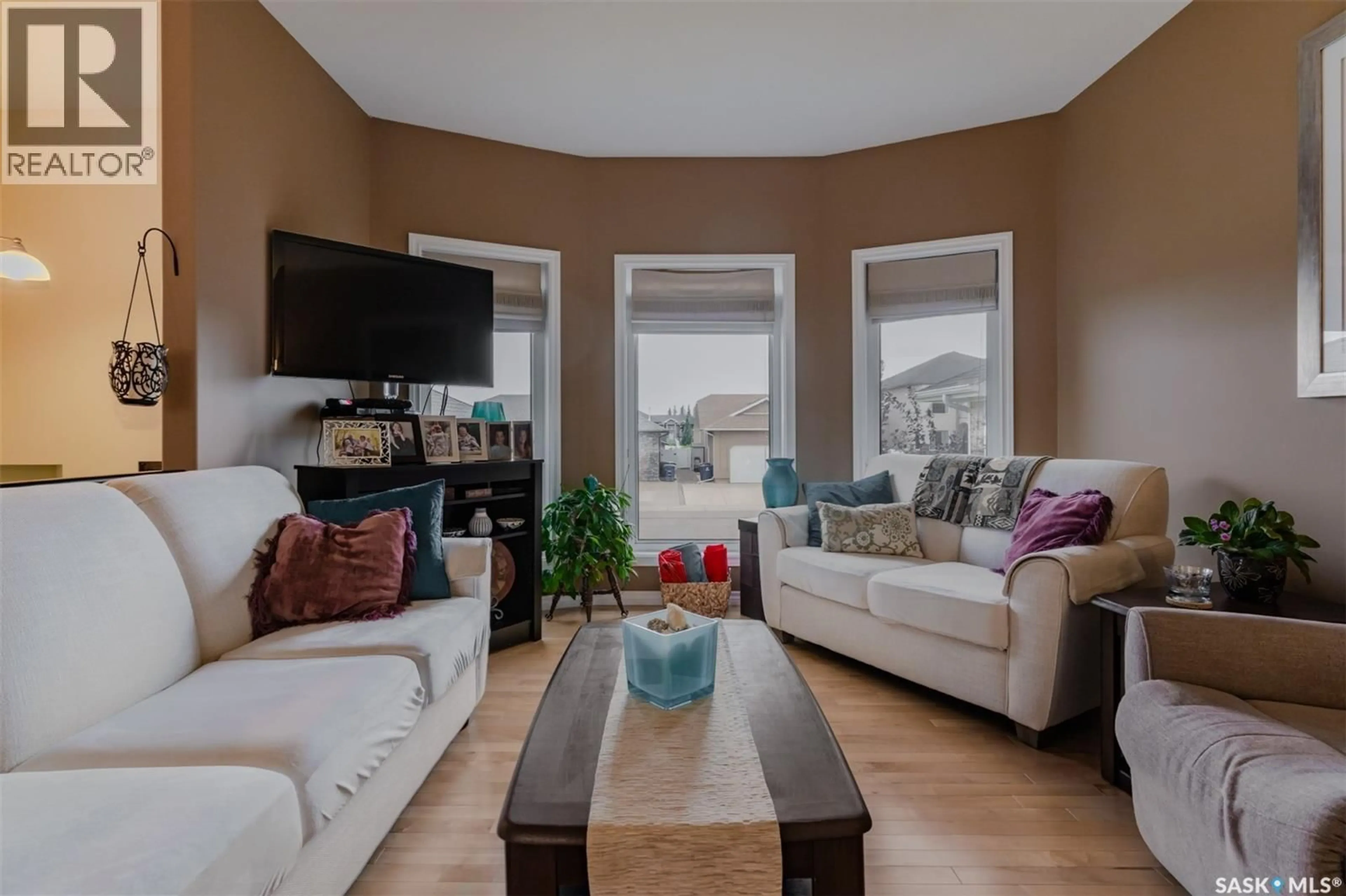 Living room with furniture, unknown for 322 NICKLAUS DRIVE, Warman Saskatchewan S0K0A1