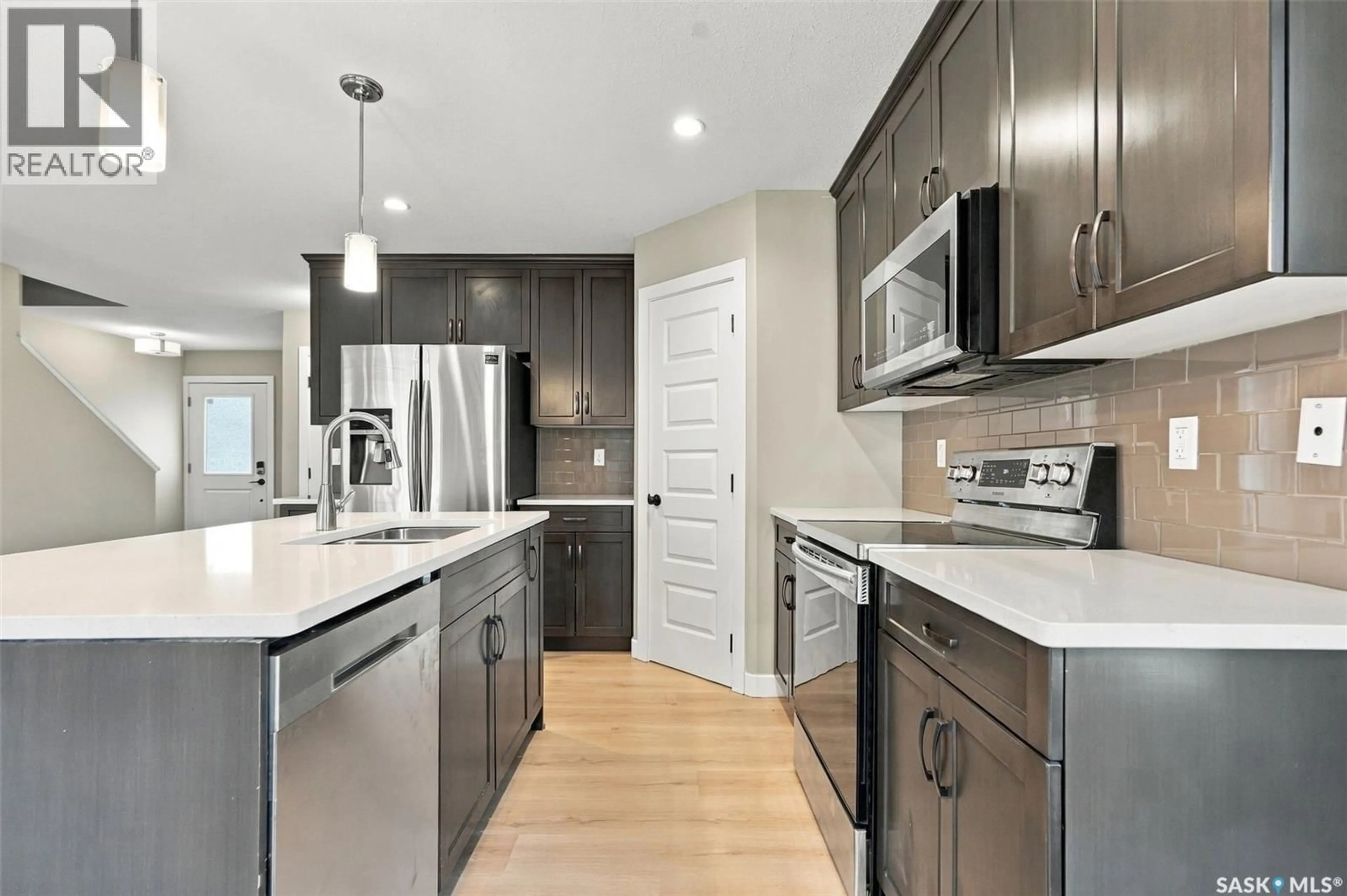 Open concept kitchen, unknown for 155 DAGNONE LANE, Saskatoon Saskatchewan S7V1P5