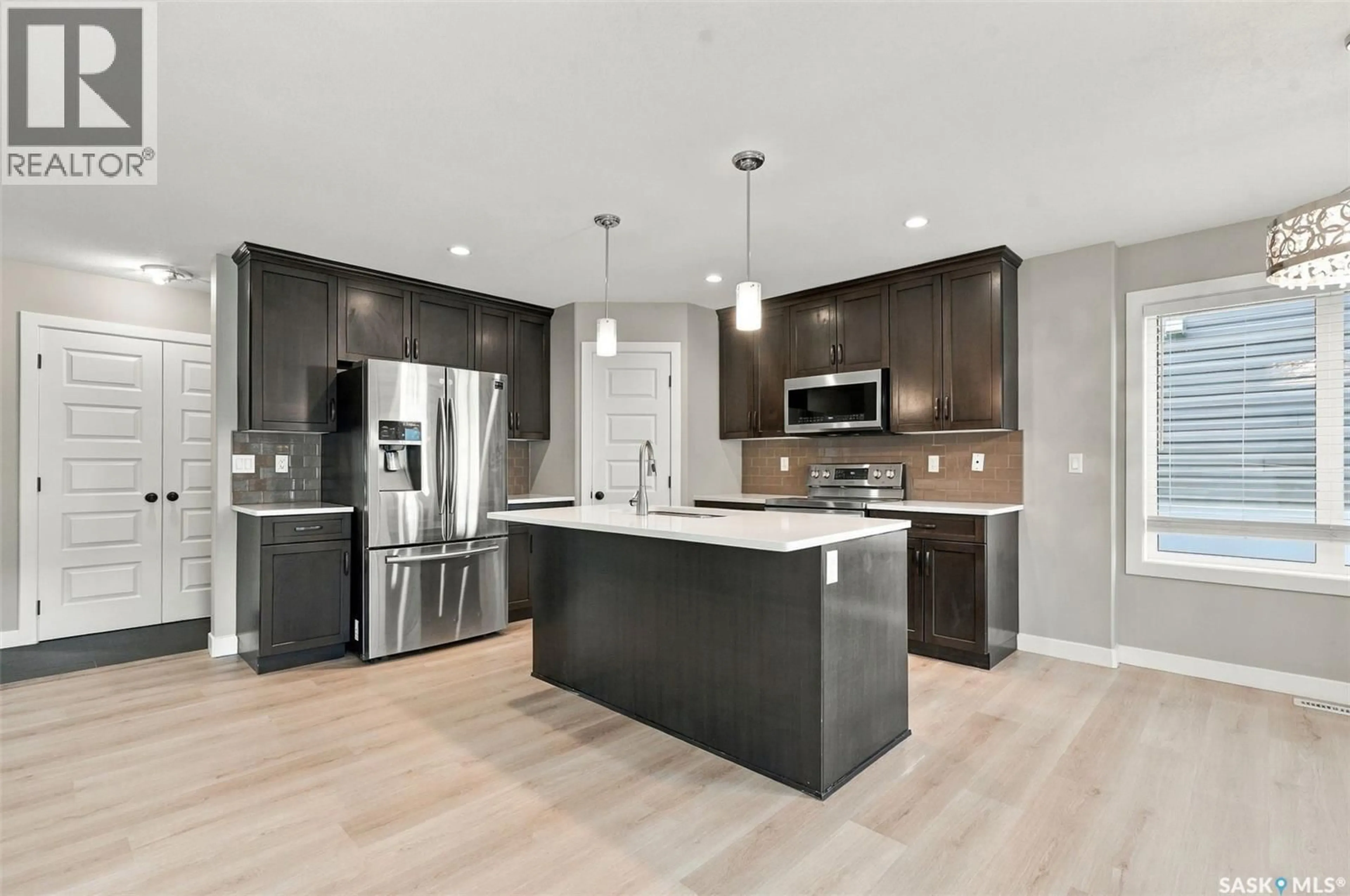 Open concept kitchen, unknown for 155 DAGNONE LANE, Saskatoon Saskatchewan S7V1P5