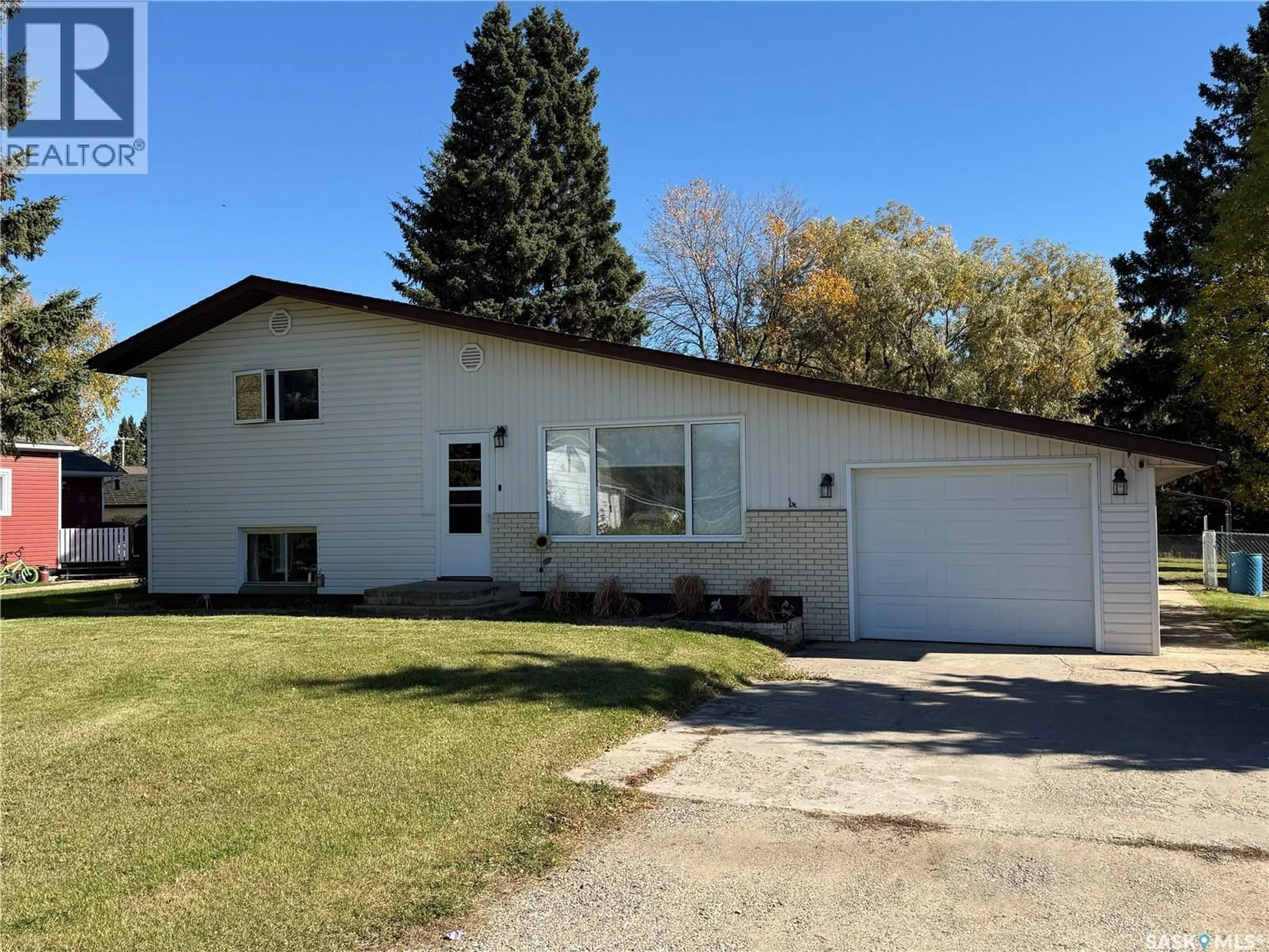 Home with vinyl exterior material, street for 4 PEPPER PLACE, Shellbrook Saskatchewan S0J2E0