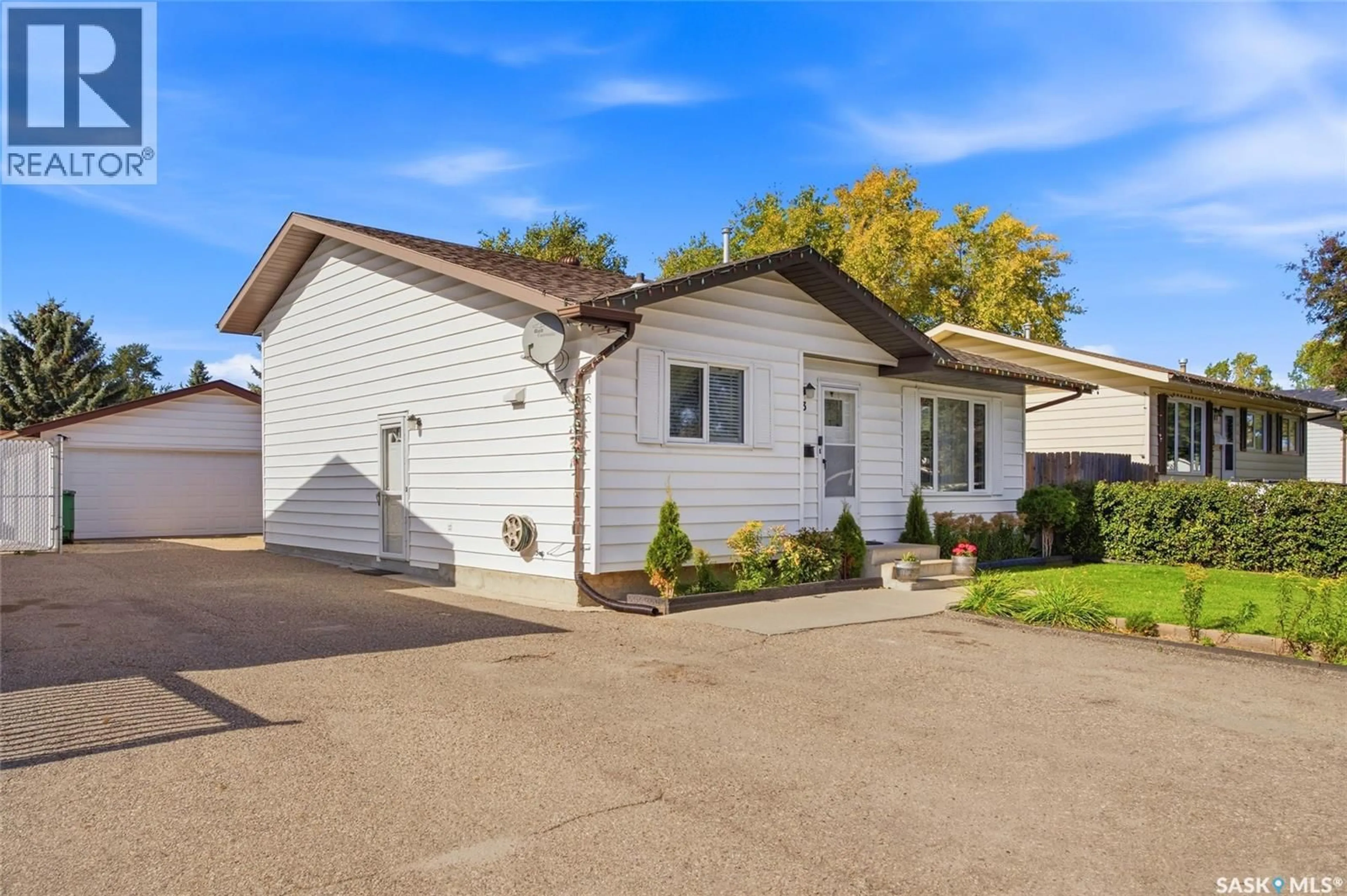 Home with vinyl exterior material, street for 403 SHERRY CRESCENT, Saskatoon Saskatchewan S7M5R9