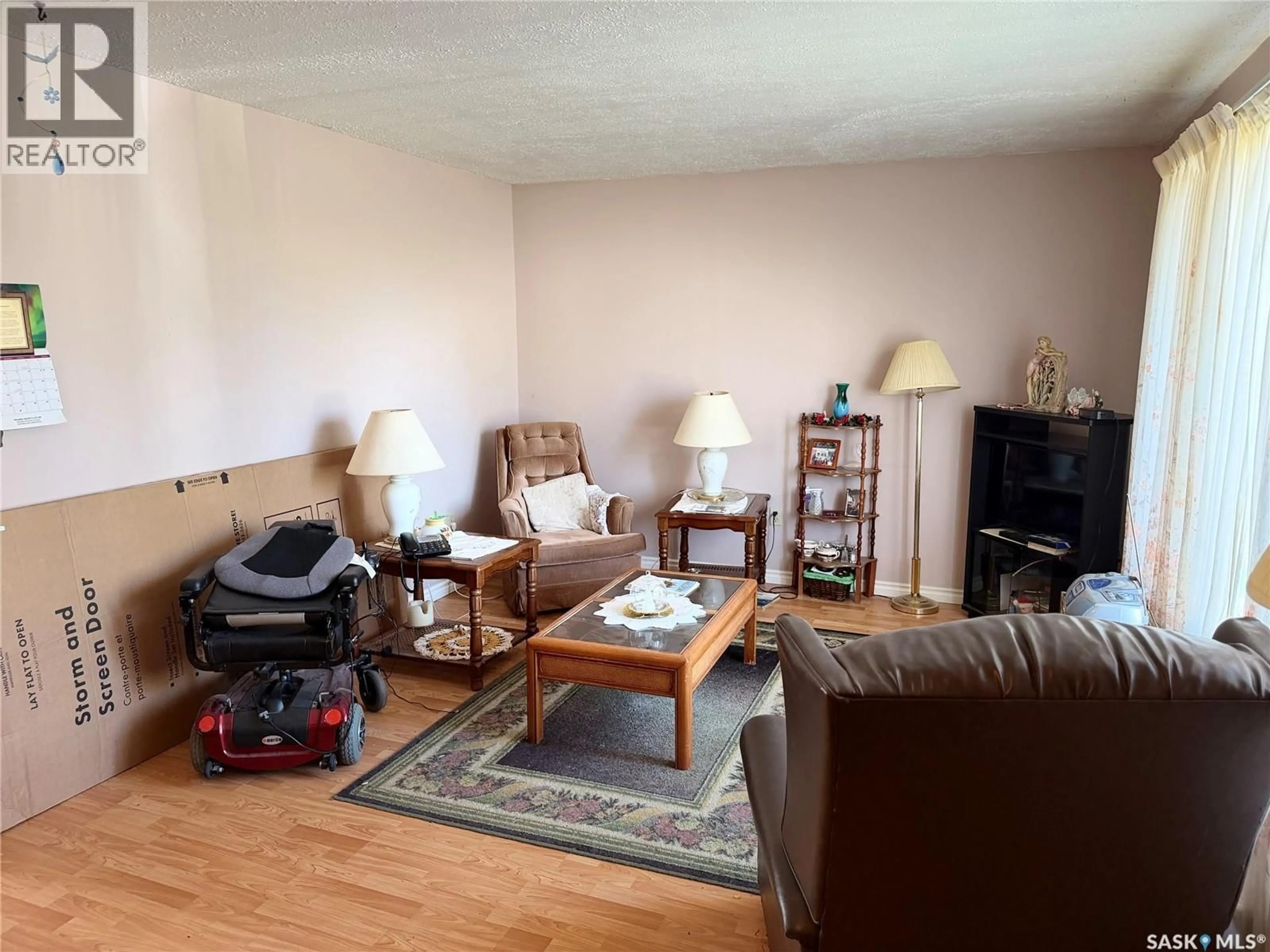 Living room with furniture, unknown for 201 2ND AVENUE, Melfort Saskatchewan S0E1A0