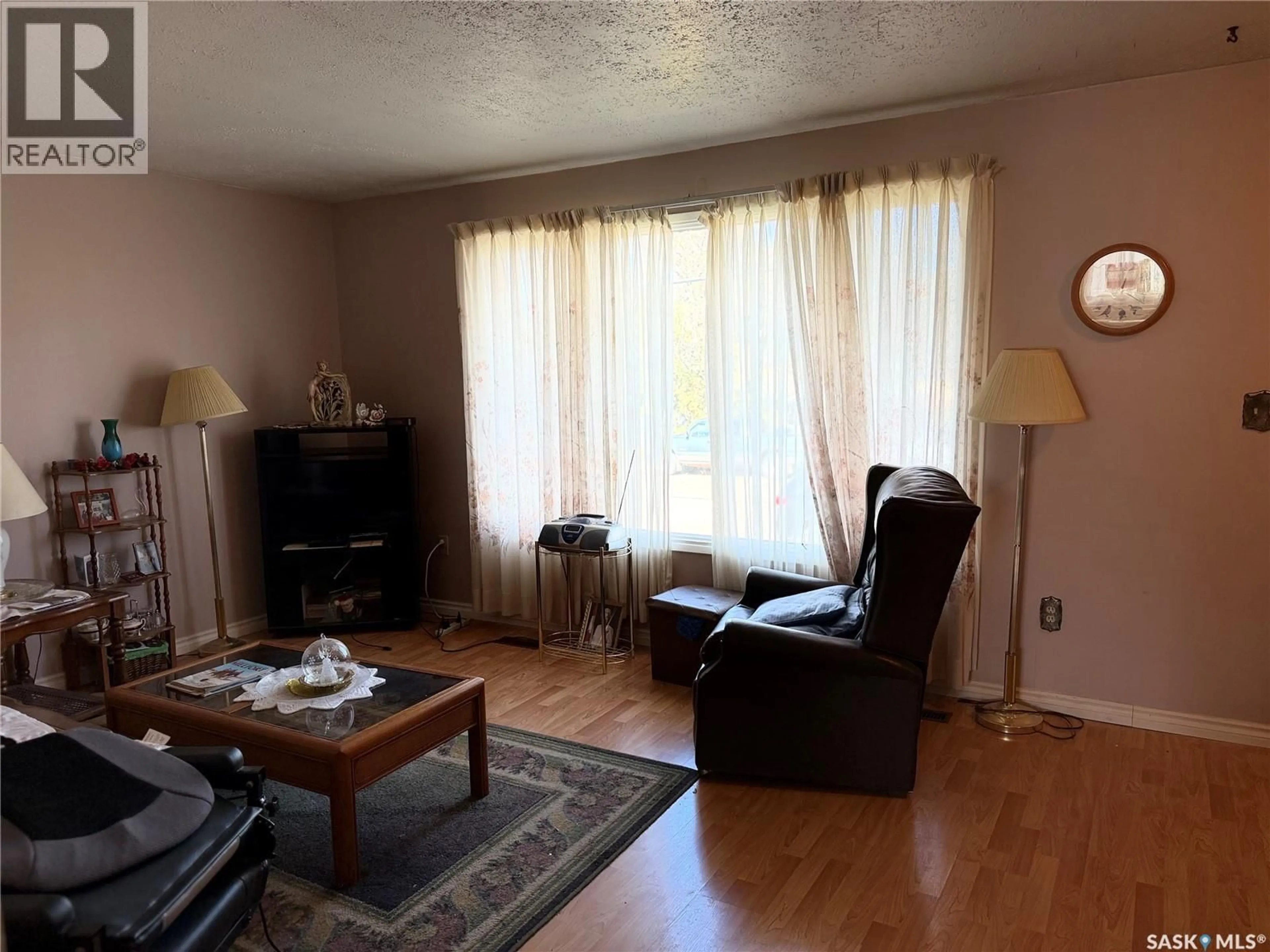 Living room with furniture, unknown for 201 2ND AVENUE, Melfort Saskatchewan S0E1A0