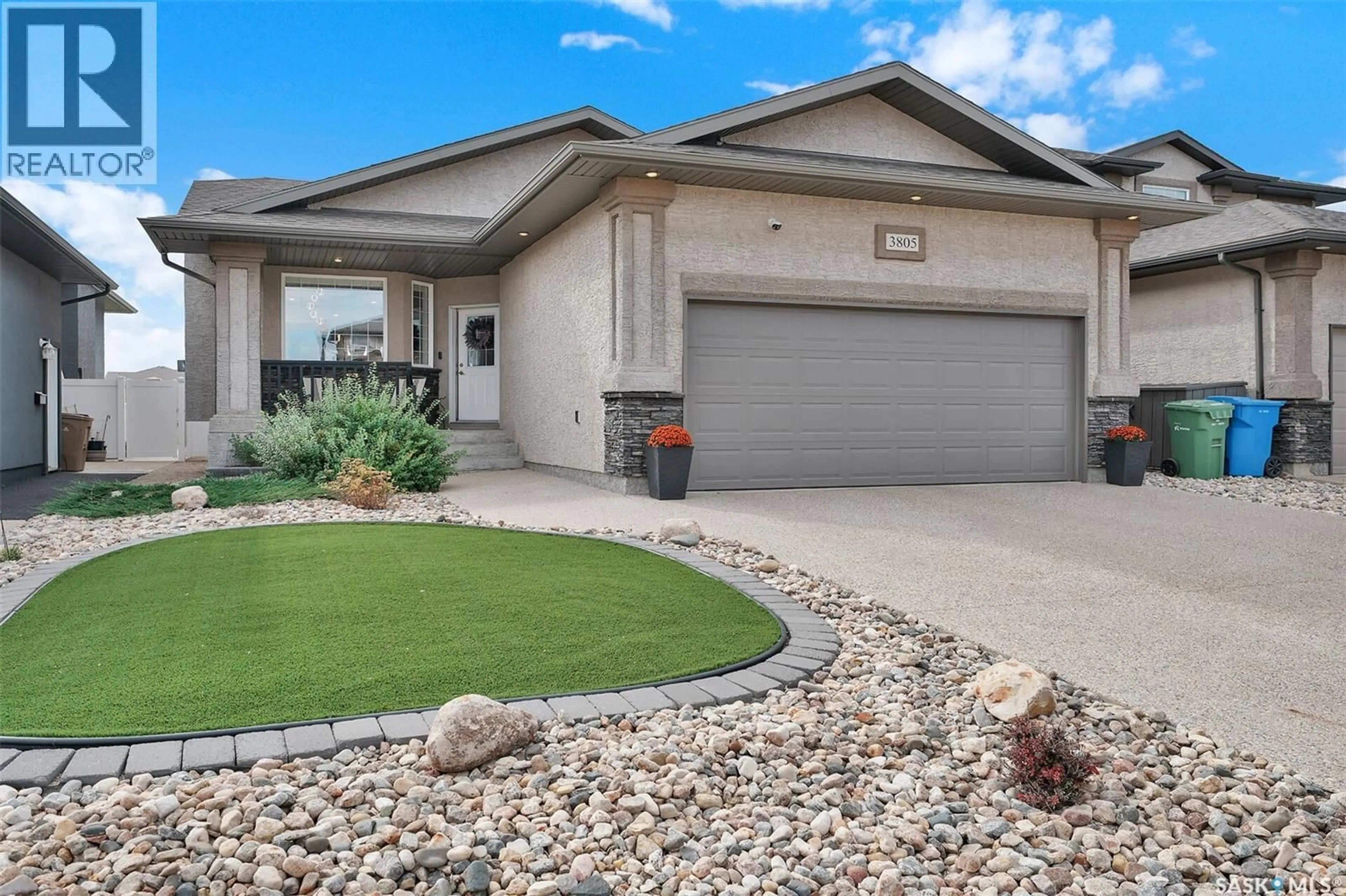 Home with vinyl exterior material, street for 3805 GREEN MOSS BAY, Regina Saskatchewan S4V1P7