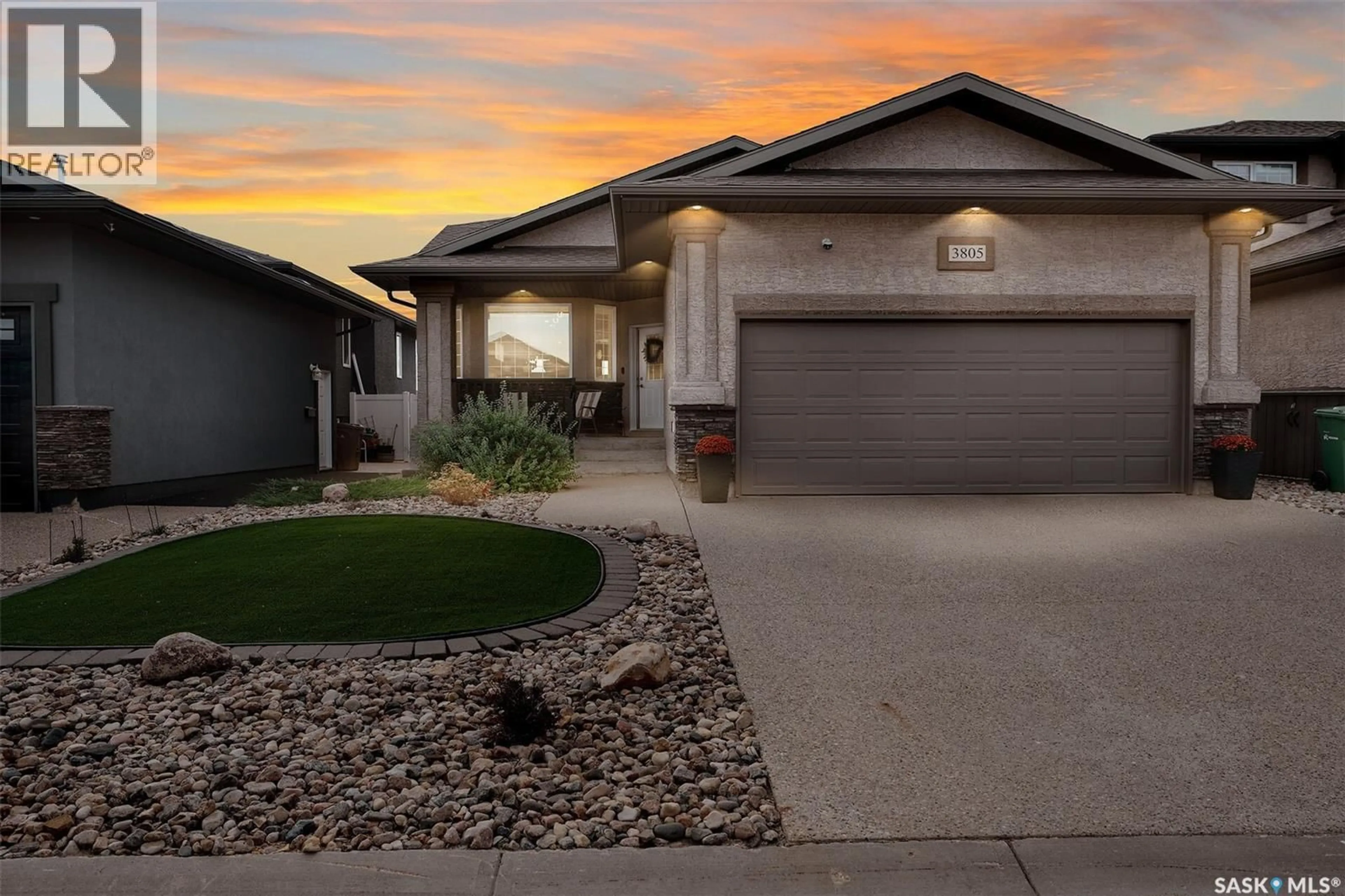 Home with vinyl exterior material, street for 3805 GREEN MOSS BAY, Regina Saskatchewan S4V1P7