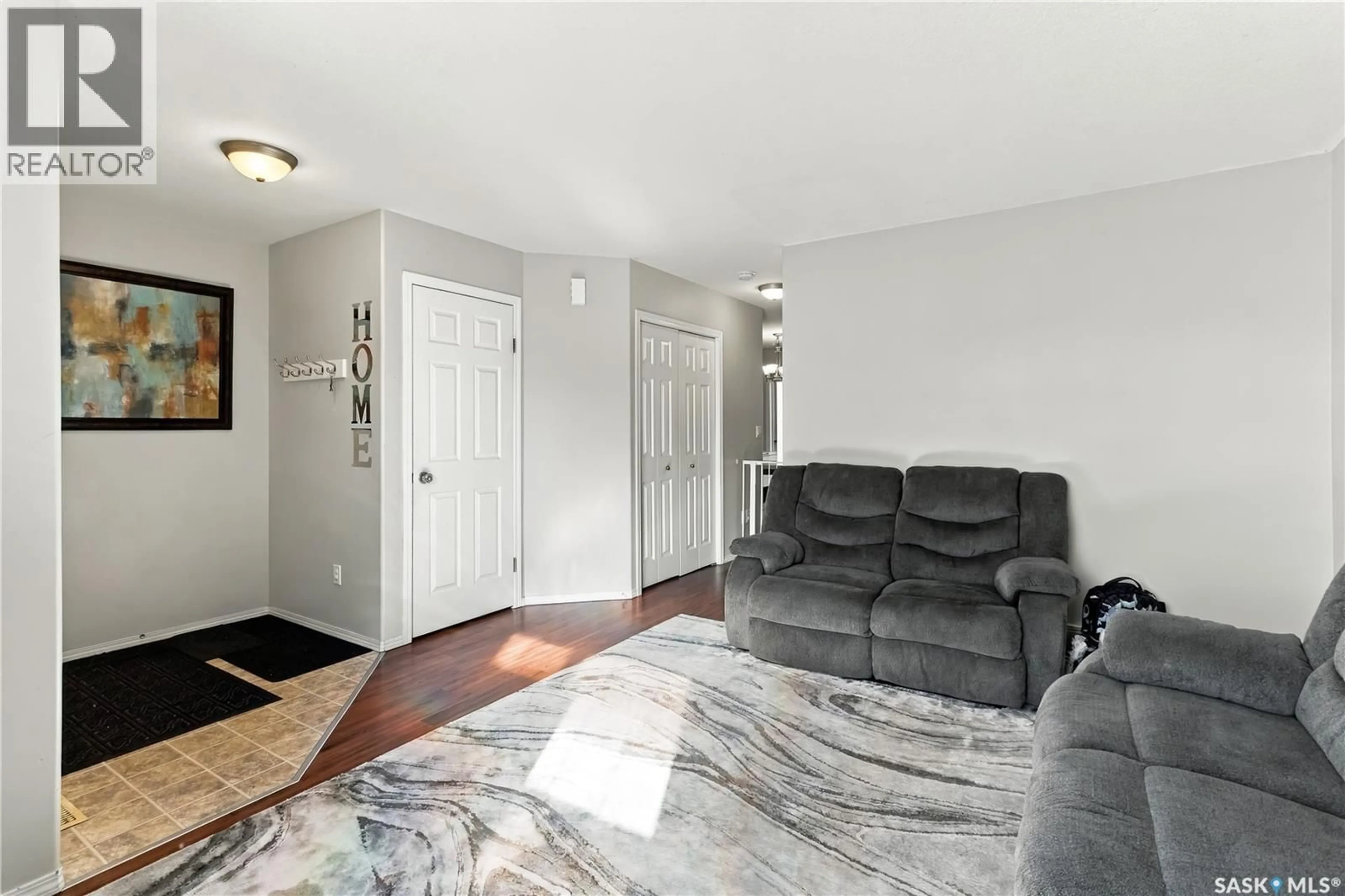 Living room with furniture, unknown for 115 203 HEROLD TERRACE, Saskatoon Saskatchewan S7V1H8