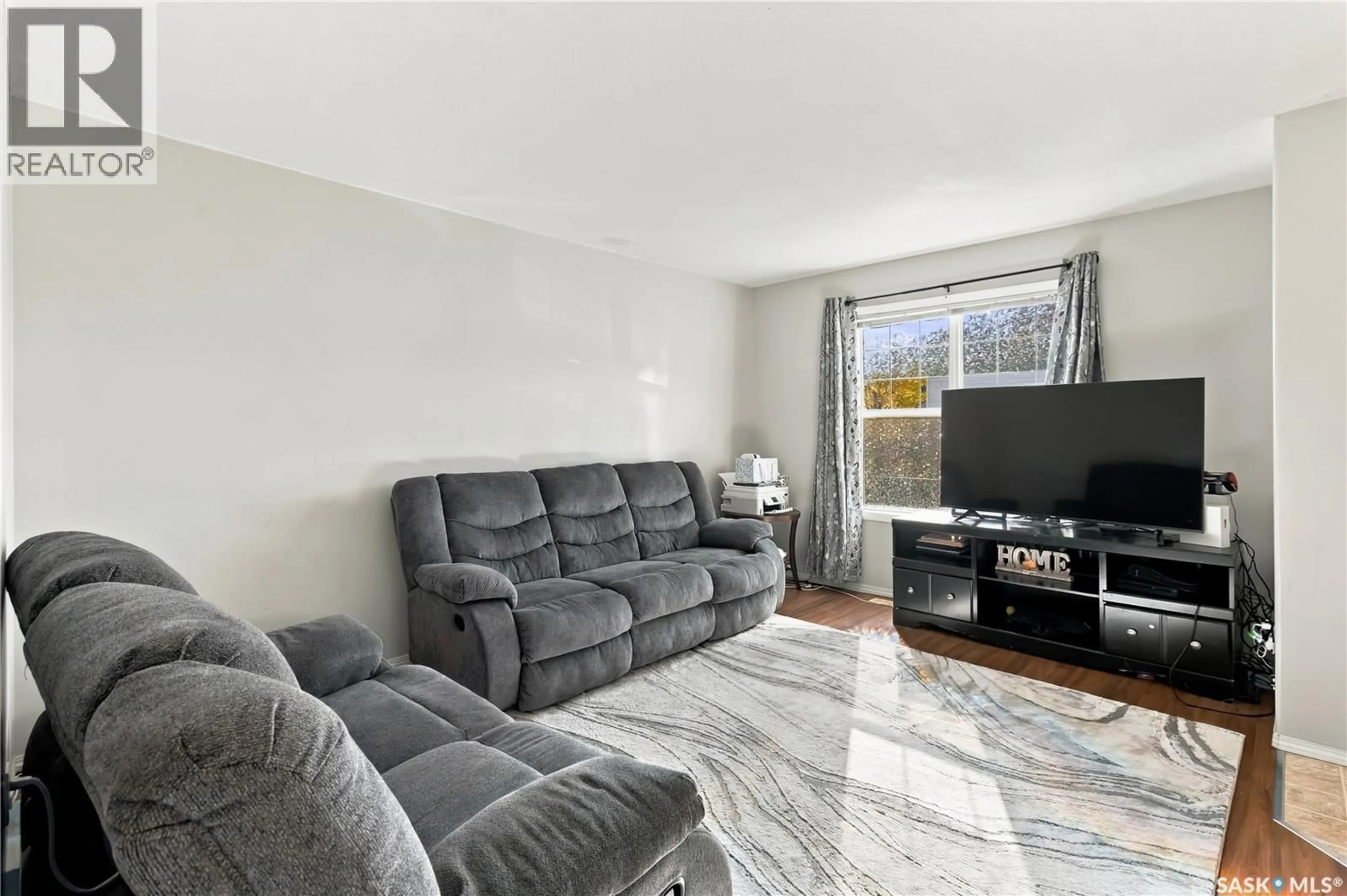 Living room with furniture, unknown for 115 203 HEROLD TERRACE, Saskatoon Saskatchewan S7V1H8