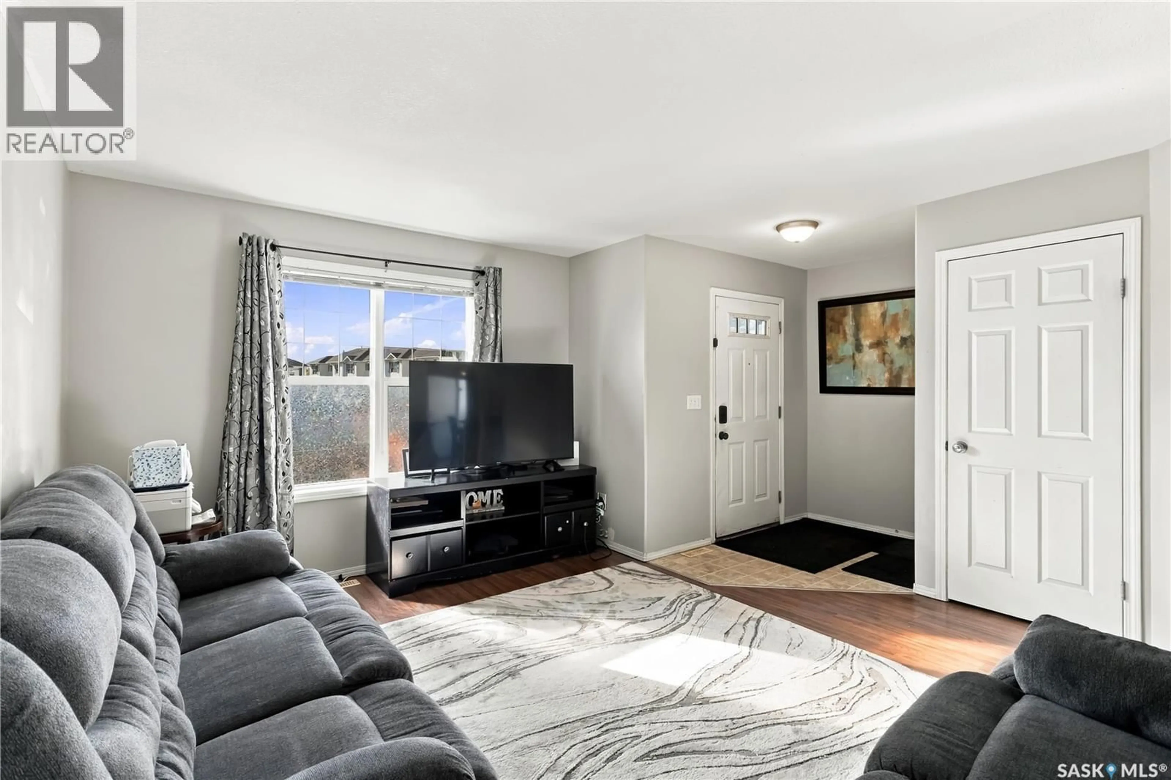 Living room with furniture, unknown for 115 203 HEROLD TERRACE, Saskatoon Saskatchewan S7V1H8