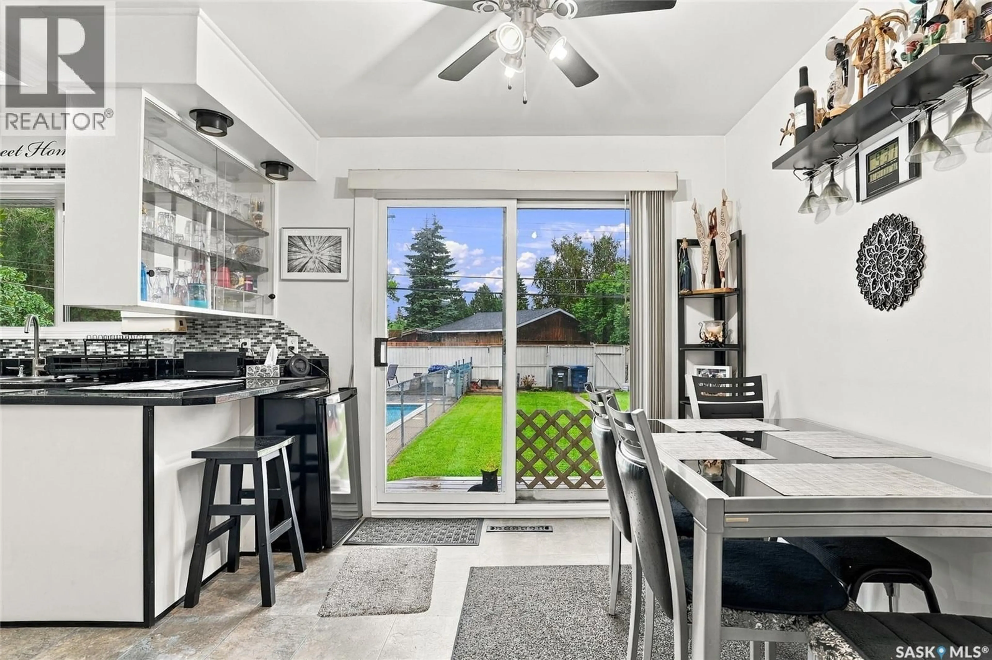 Open concept kitchen, ceramic/tile floor for 2107 CUMBERLAND AVENUE, Saskatoon Saskatchewan S7J1Z2
